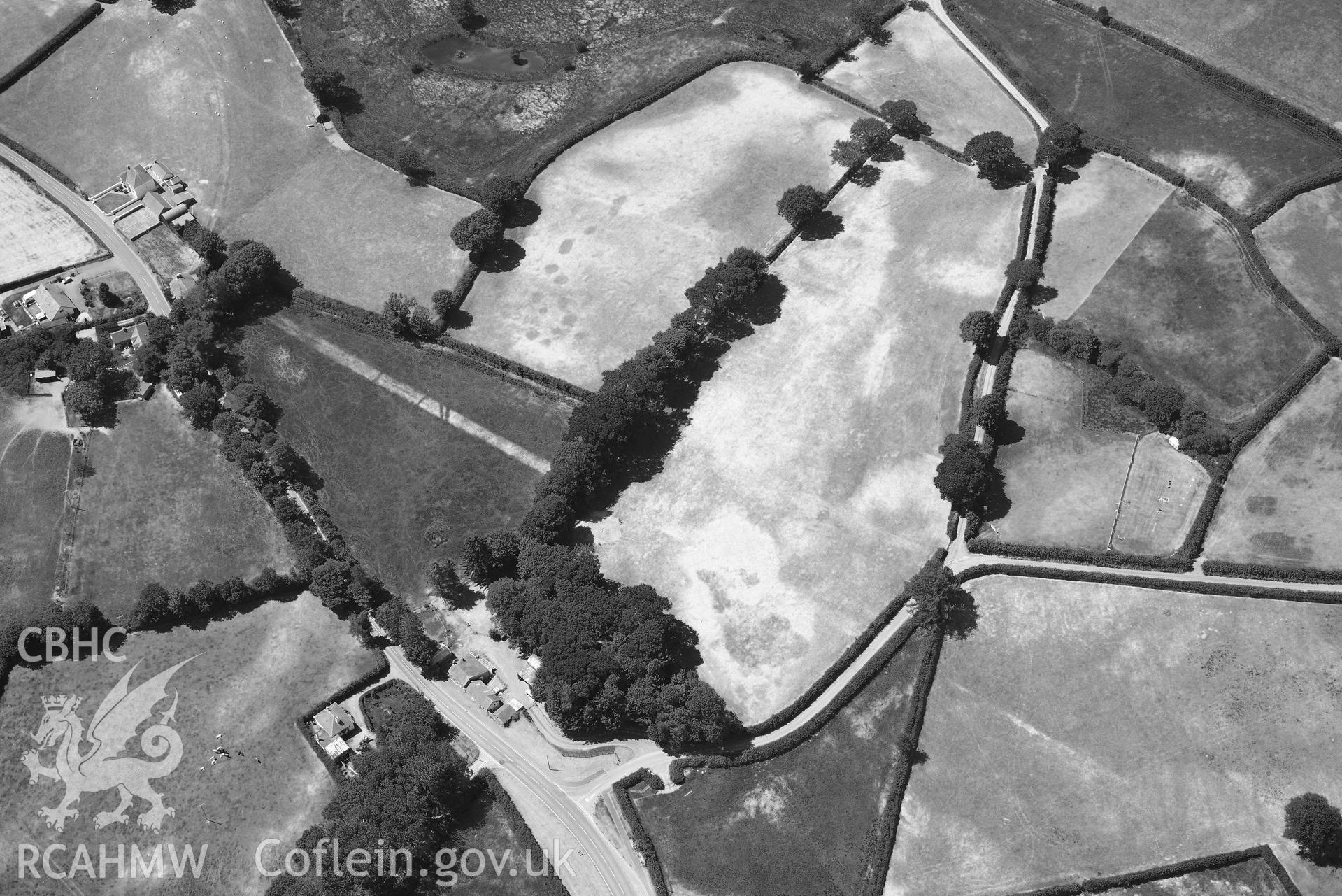 RCAHMW black and white oblique aerial photograph of Aber Giar Roman Road and pits taken on 9 July 2018 by Toby Driver