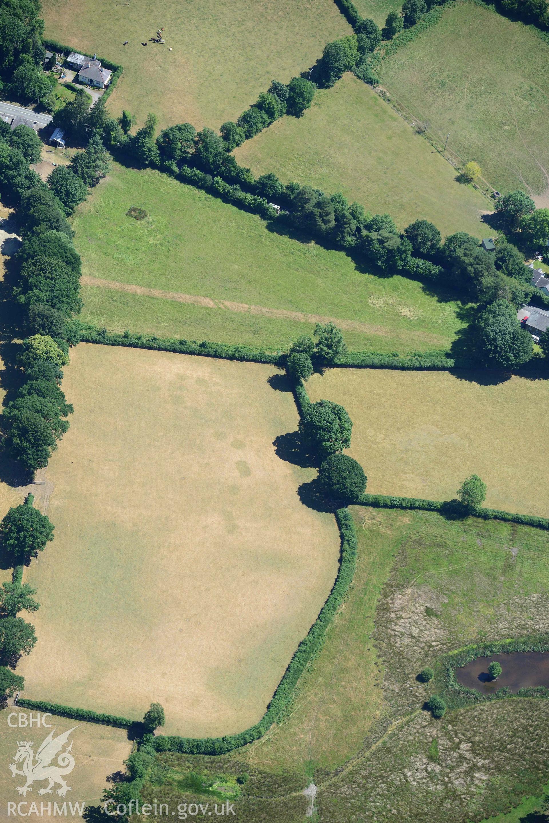 RCAHMW colour oblique aerial photograph of Aber Giar Roman Road and pits taken on 9 July 2018 by Toby Driver