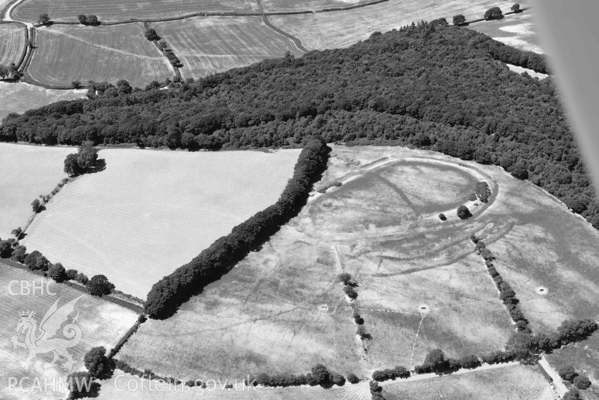 RCAHMW black and white oblique aerial photograph of Castell Allt Goch lampeter and Roman camp at Castell Allt Goch taken on 9 July 2018 by Toby Driver