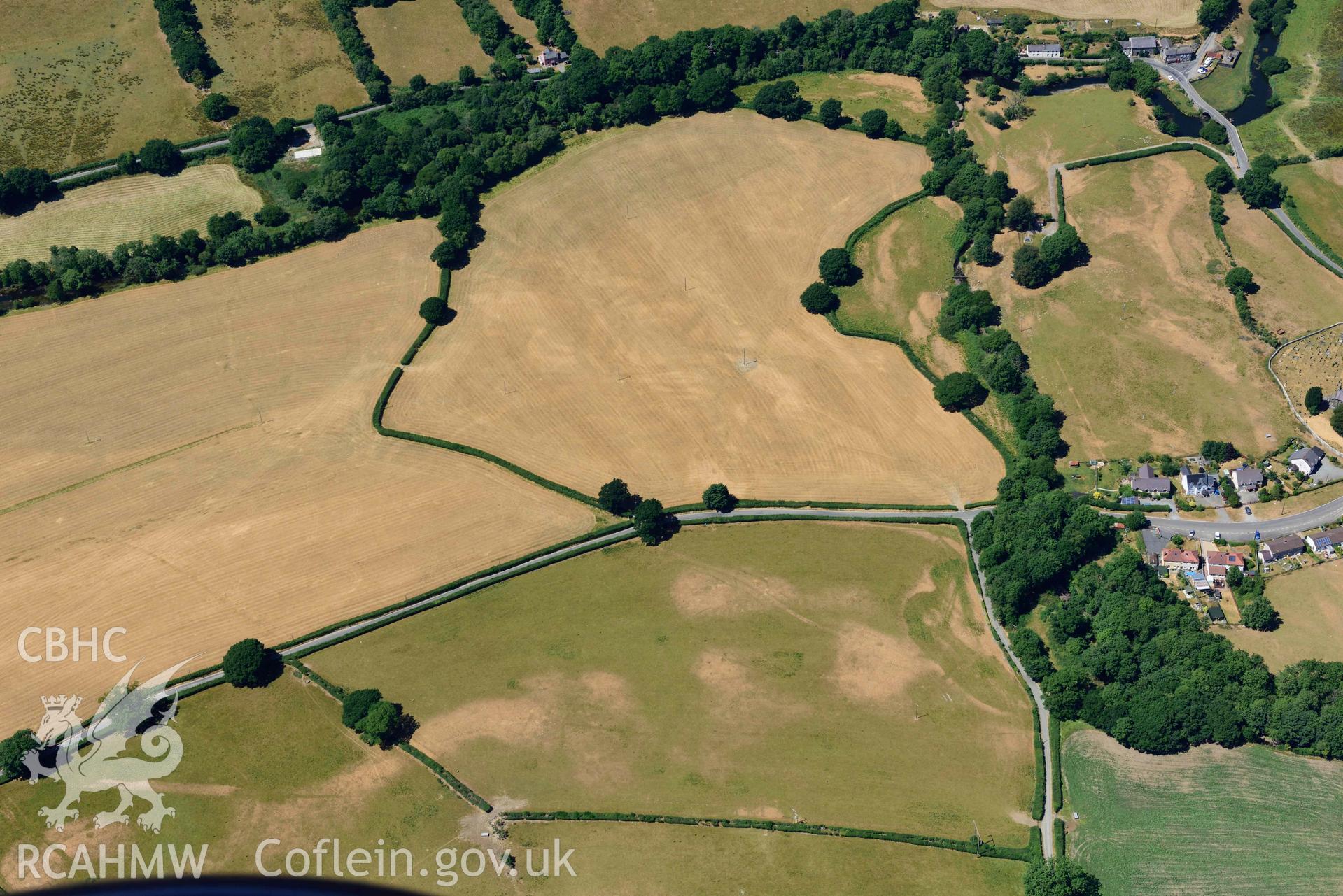 RCAHMW colour oblique aerial photograph of Pentre Llanfair Roman road and roadside settlement taken on 9 July 2018 by Toby Driver