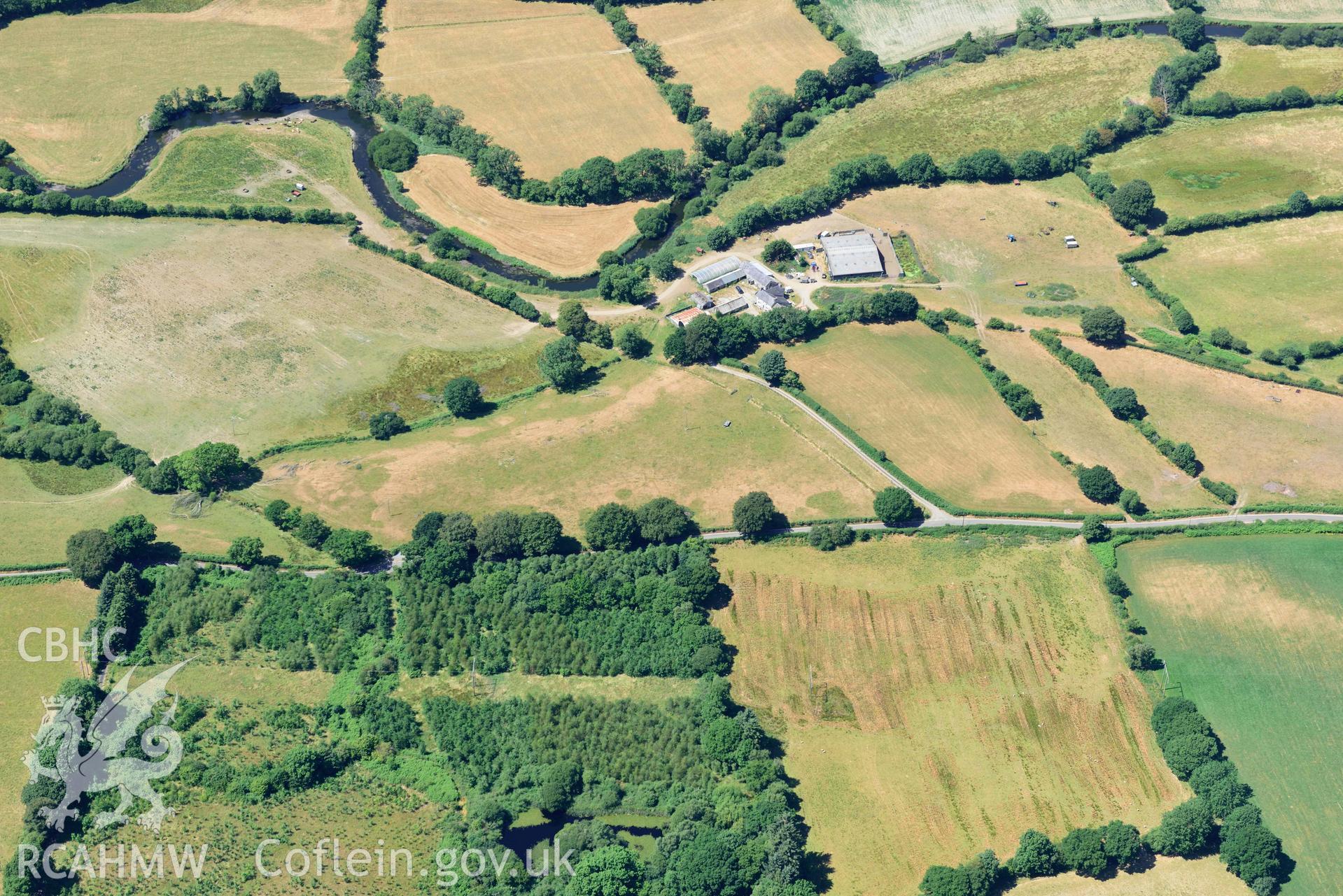 RCAHMW colour oblique aerial photograph of Pen-ddol Roman Road quarry pits ( SN 636529) taken on 9 July 2018 by Toby Driver