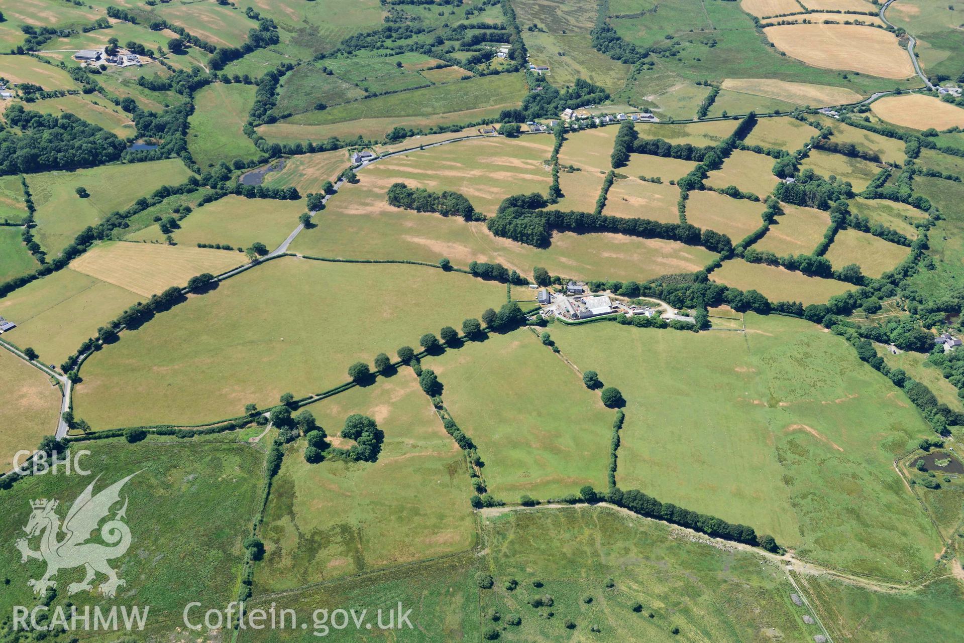 RCAHMW colour oblique aerial photograph of Maes Glas farm taken on 9 July 2018 by Toby Driver