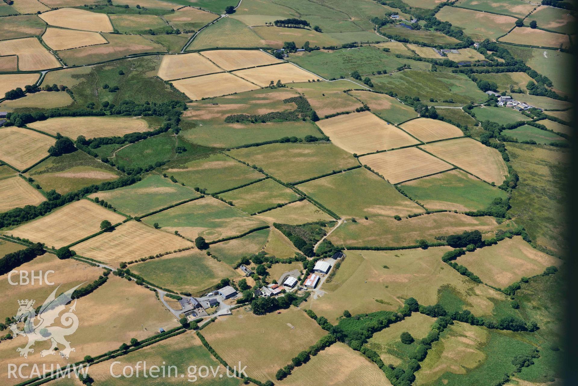 RCAHMW colour oblique aerial photograph of  Castell Llwyn Gwinau taken on 9 July 2018 by Toby Driver