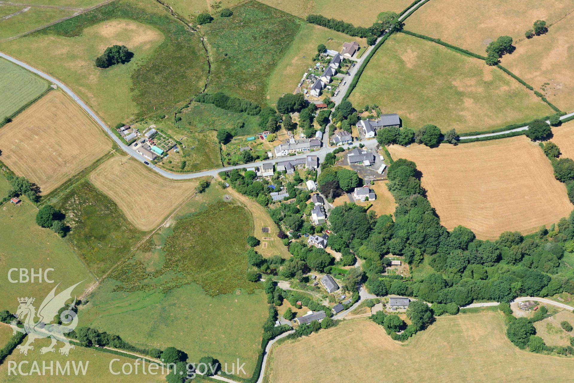 RCAHMW colour oblique aerial photograph of  Swyddffynnon village taken on 9 July 2018 by Toby Driver