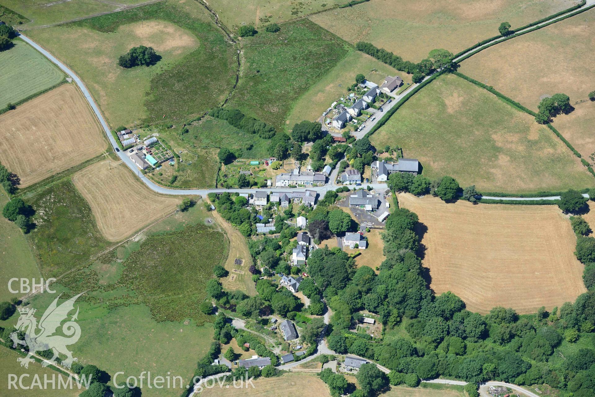 RCAHMW colour oblique aerial photograph of  Swyddffynnon village taken on 9 July 2018 by Toby Driver