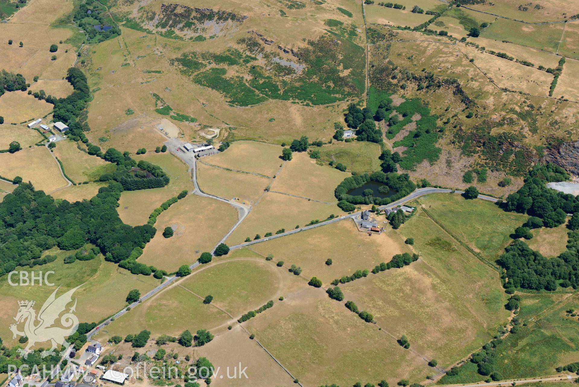 RCAHMW colour oblique aerial photograph of Ystrad Meurig quarry taken on 9 July 2018 by Toby Driver