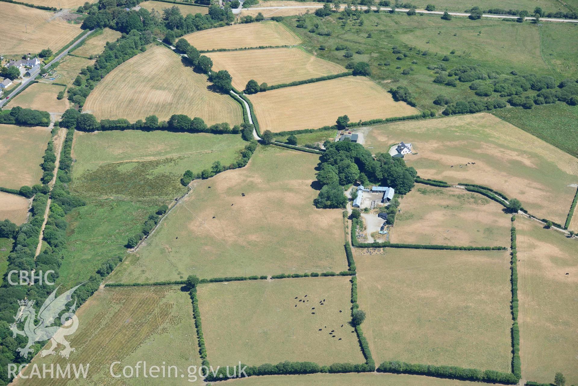 RCAHMW colour oblique aerial photograph of Maebandlog rectangular enclosure taken on 9 July 2018 by Toby Driver