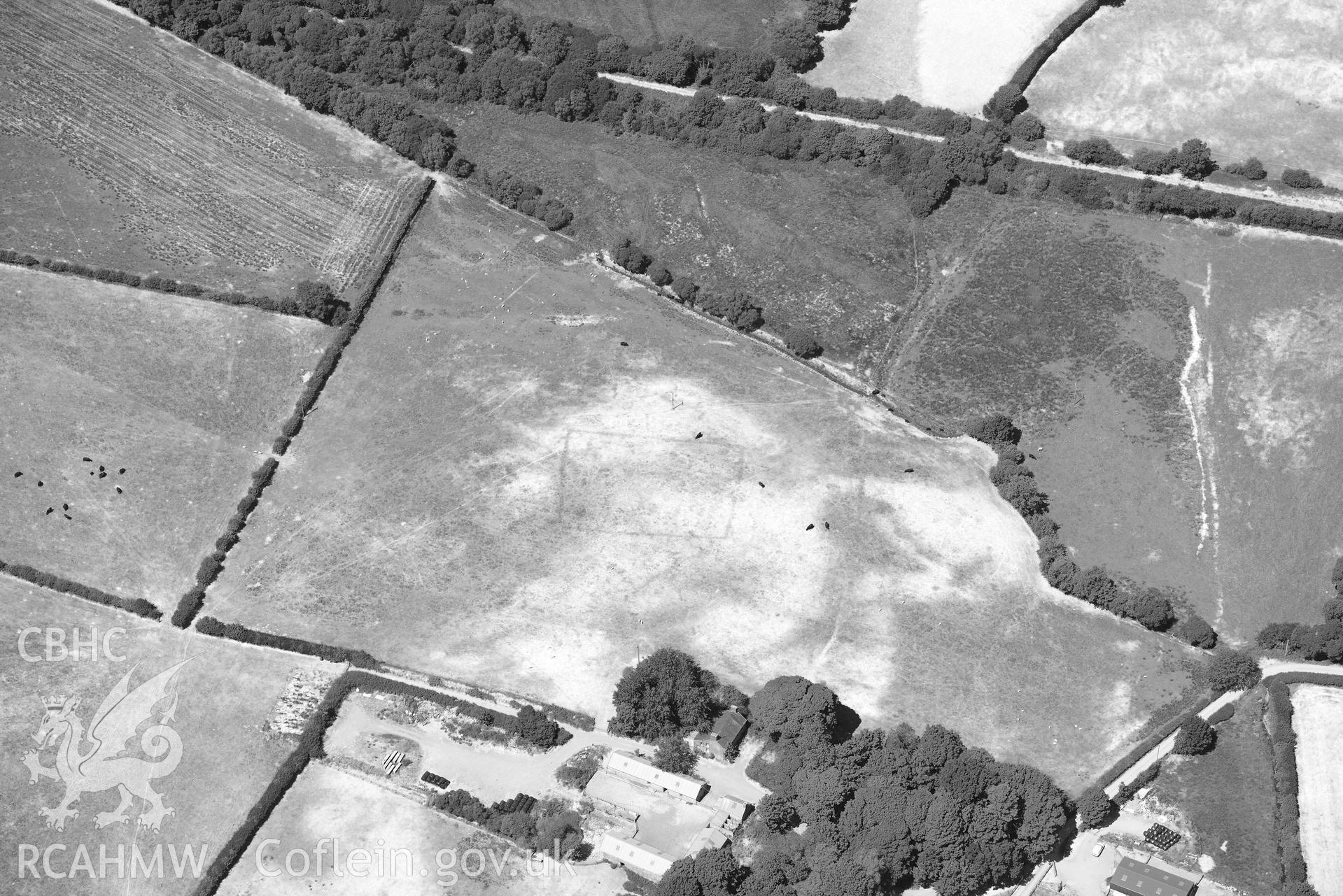 RCAHMW colour oblique aerial photograph of Maebandlog rectangular enclosure taken on 9 July 2018 by Toby Driver