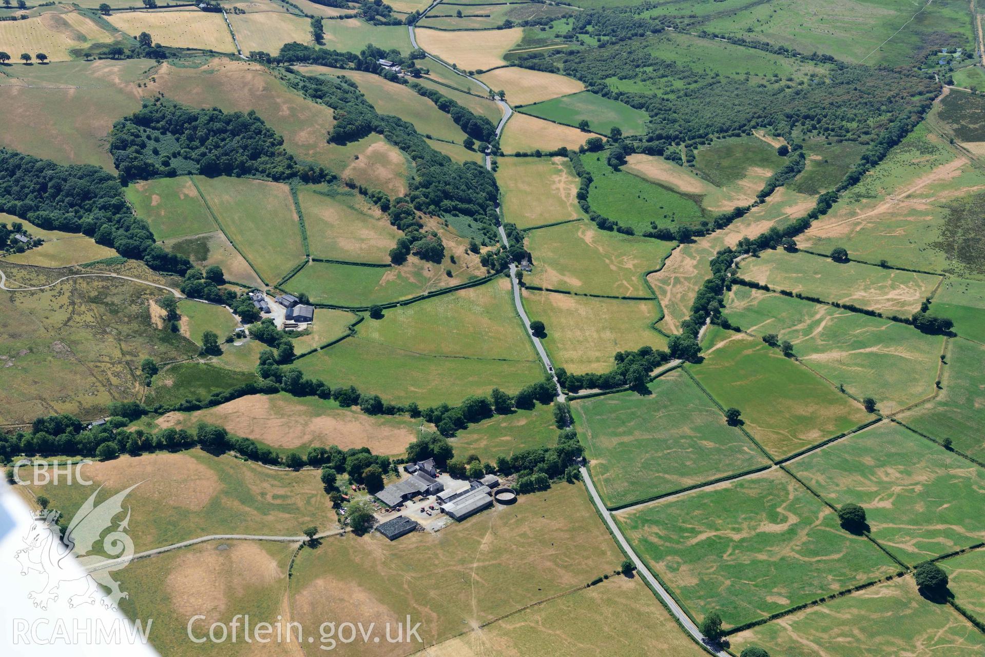 RCAHMW colour oblique aerial photograph of Old Abbey Farm 2 and Site of Hen Fynachlog taken on 9 July 2018 by Toby Driver