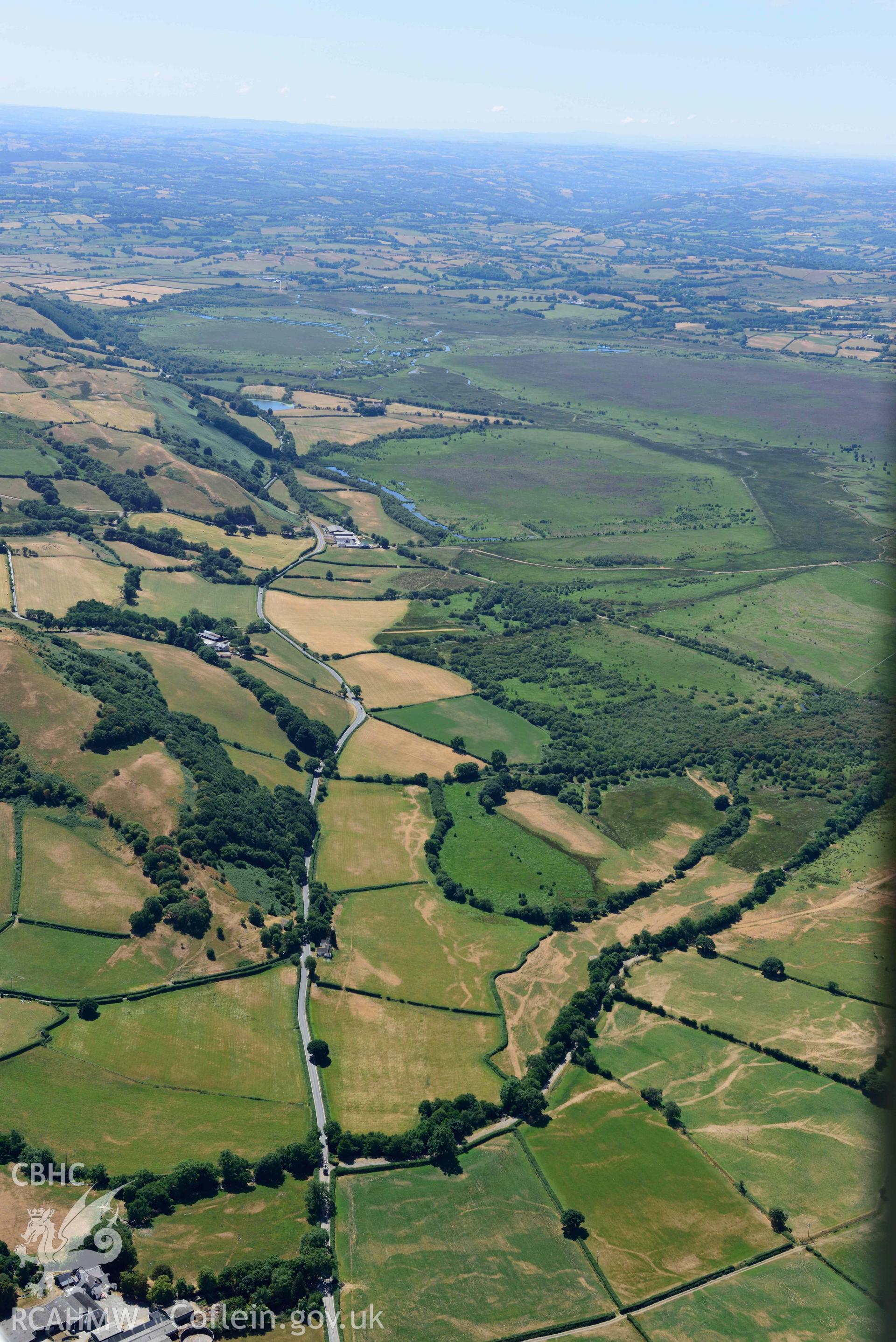 RCAHMW colour oblique aerial photograph of Old Abbey Farm 2 and Site of Hen Fynachlog taken on 9 July 2018 by Toby Driver