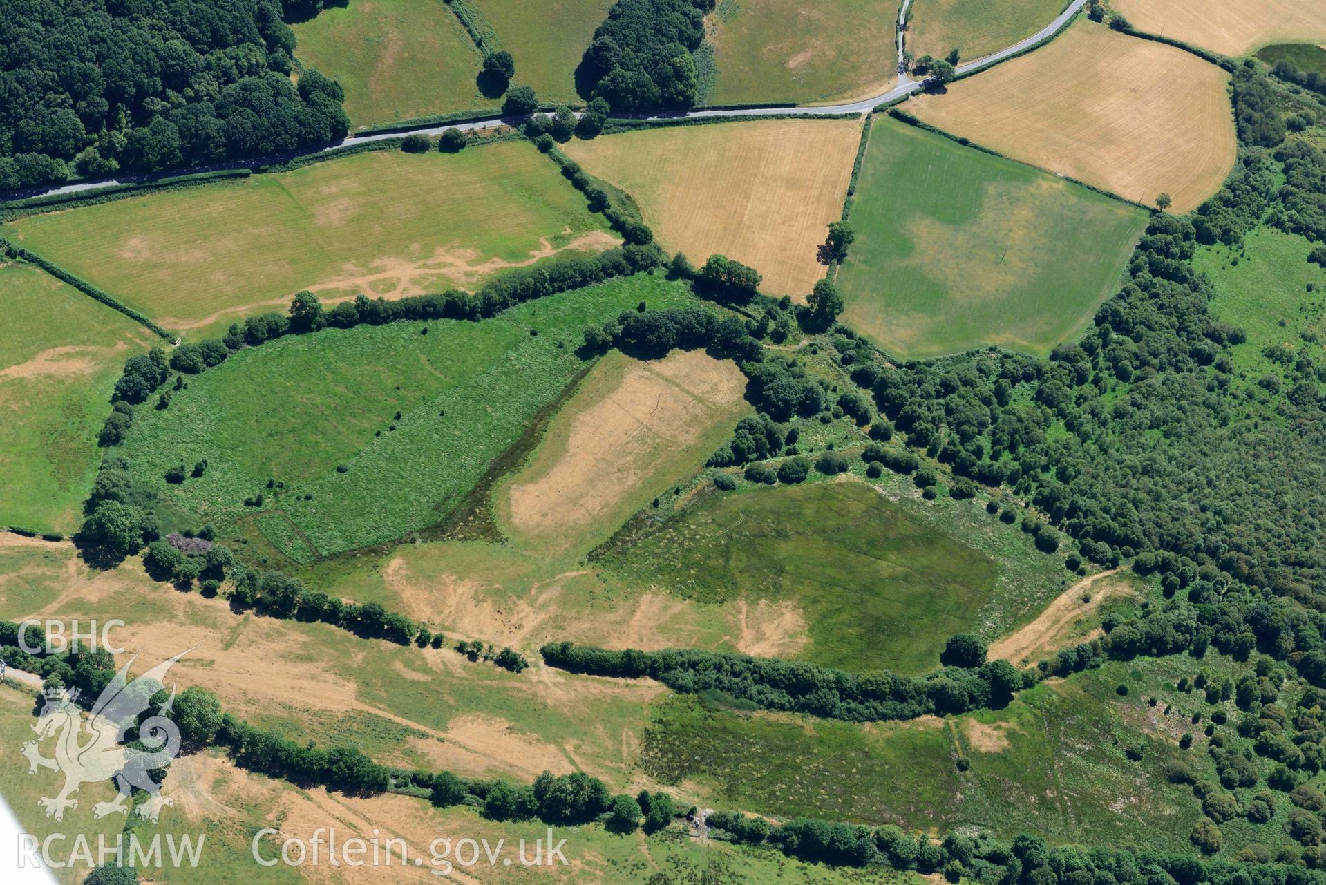 RCAHMW colour oblique aerial photograph of Old Abbey Farm 2 and Site of Hen Fynachlog taken on 9 July 2018 by Toby Driver