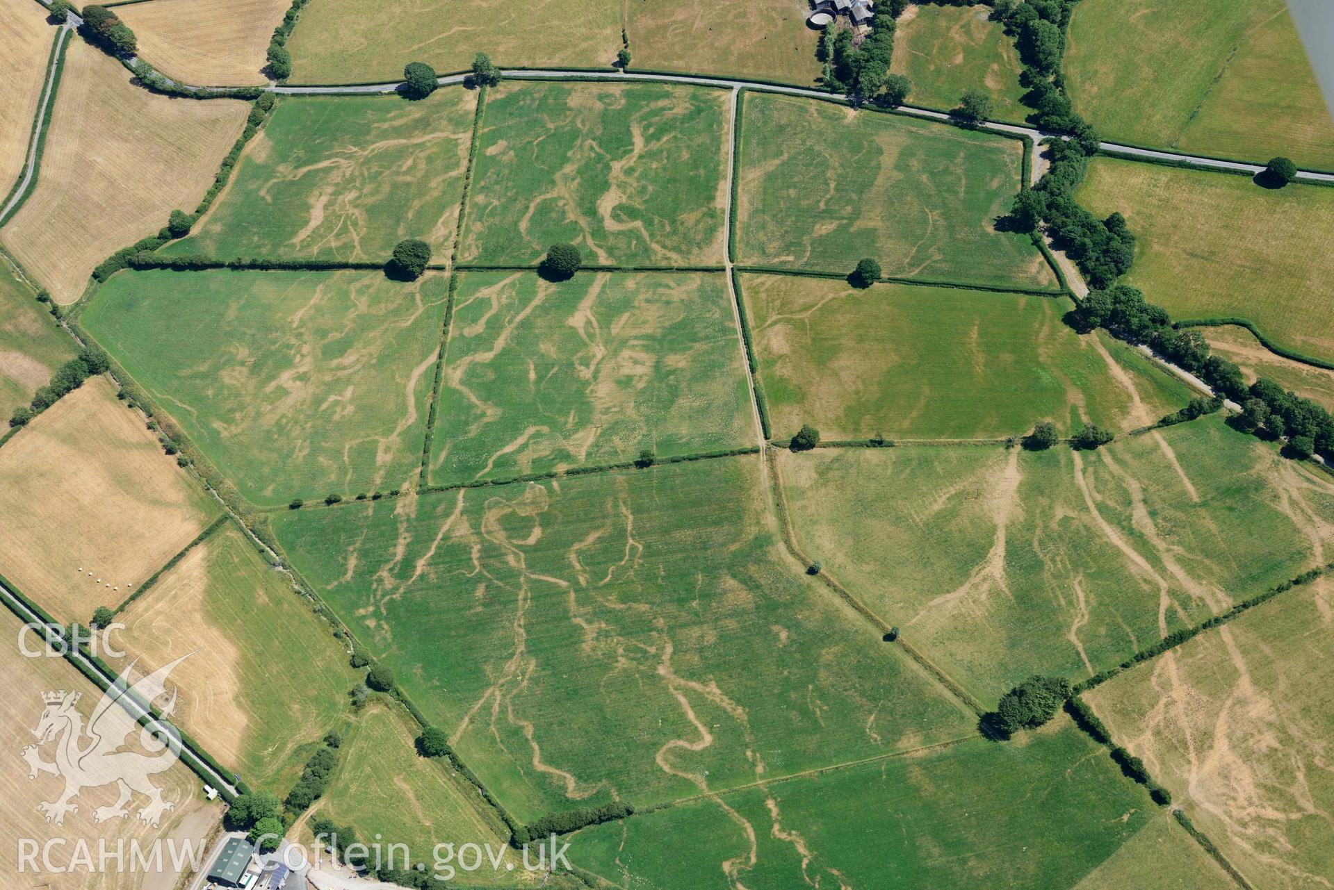 RCAHMW black and white oblique aerial photograph of Old Abbey Farm 2 and Site of Hen Fynachlog and Pont Fflur Roman enclosure taken on 9 July 2018 by Toby Driver