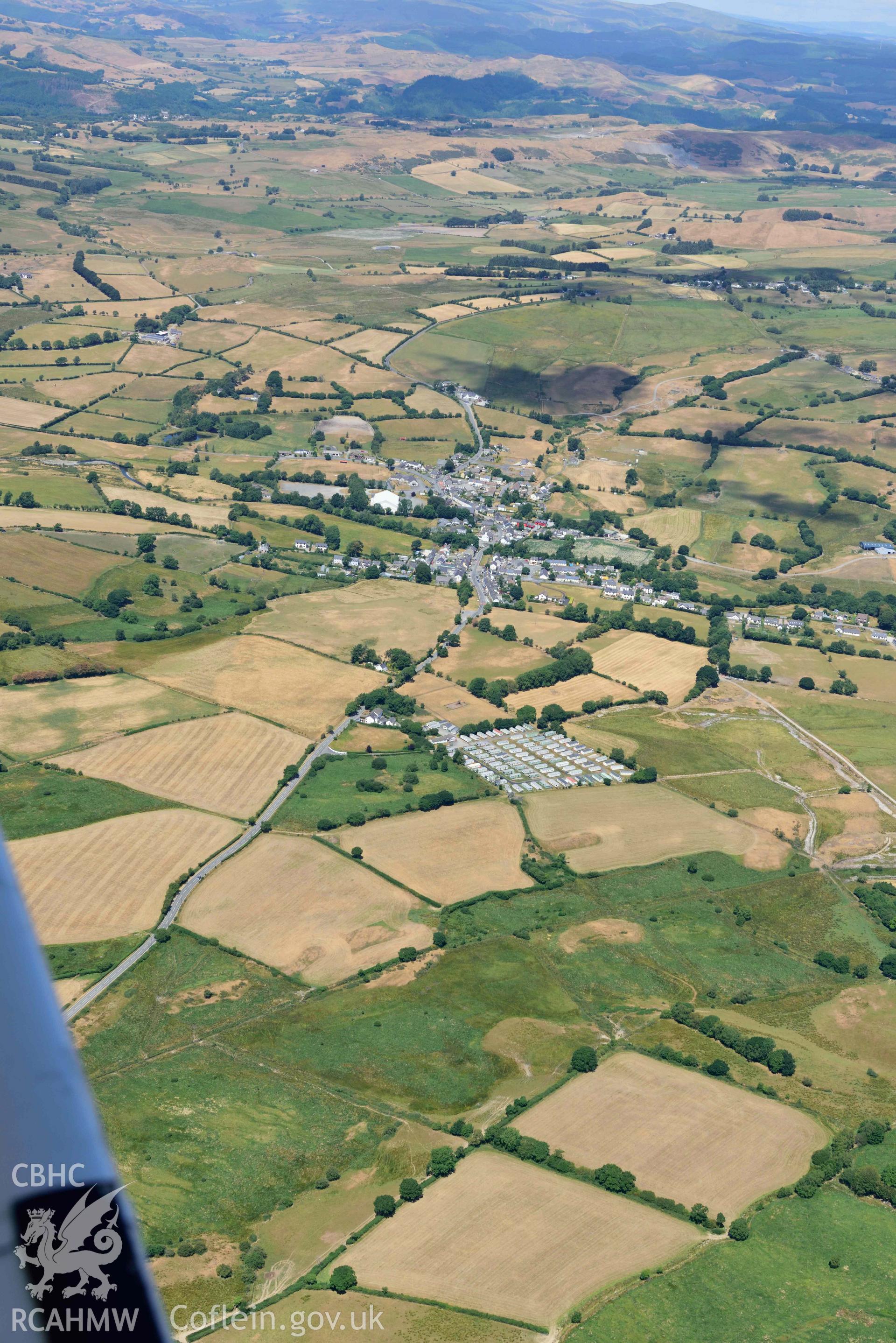 RCAHMW colour oblique aerial photograph of Pontrhydfendigaid village taken on 9 July 2018 by Toby Driver