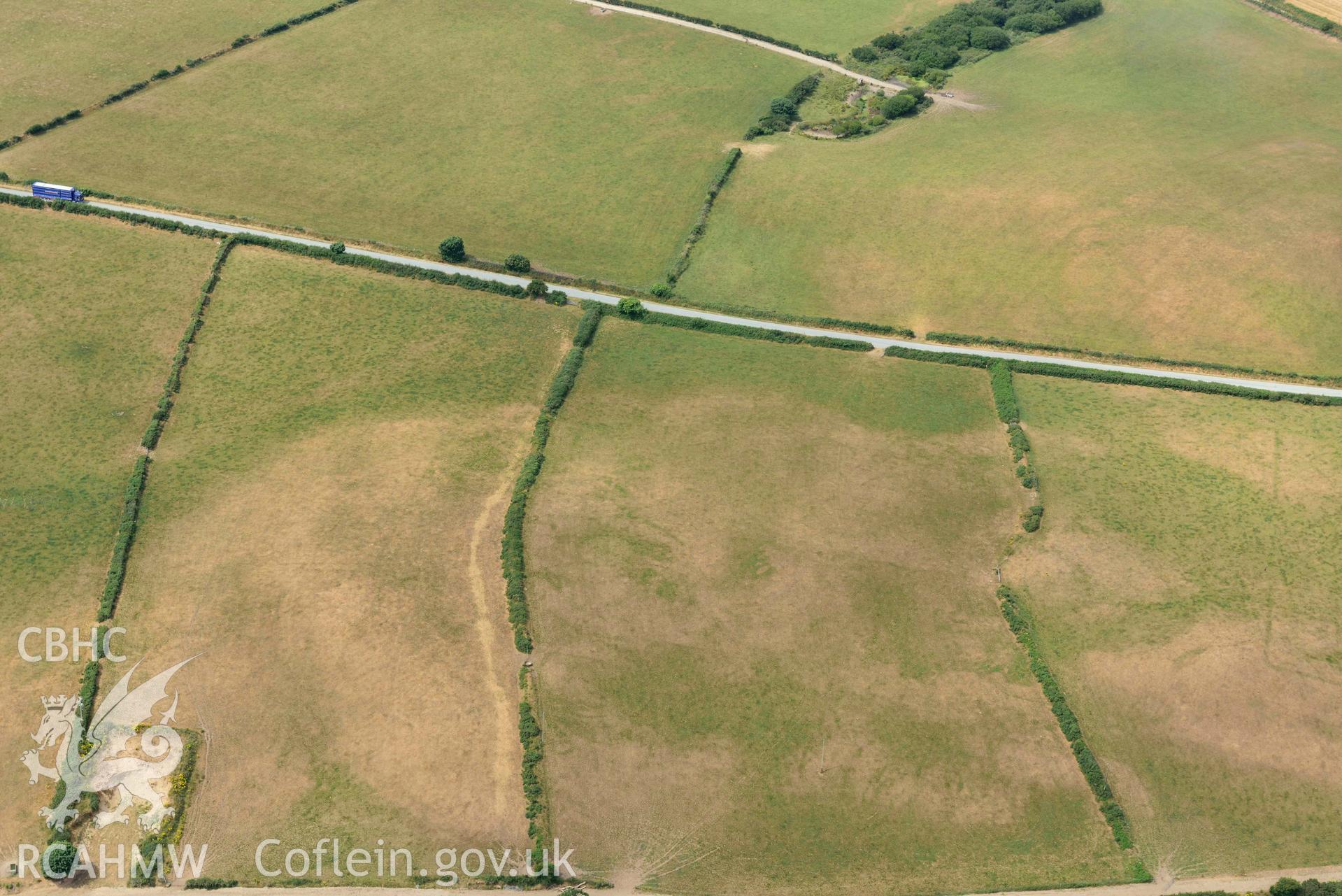 RCAHMW colour oblique aerial photograph of Crugiau Cemmaes Barrow Cemetary taken on 11 July 2018 by Toby Driver