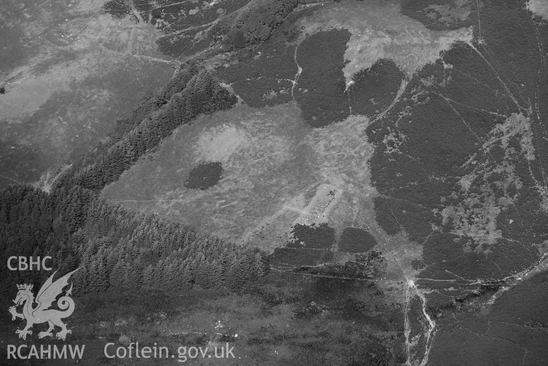 RCAHMW black and white oblique aerial photograph of  Sheepcote Troed y rhiw taken on 9 July 2018 by Toby Driver