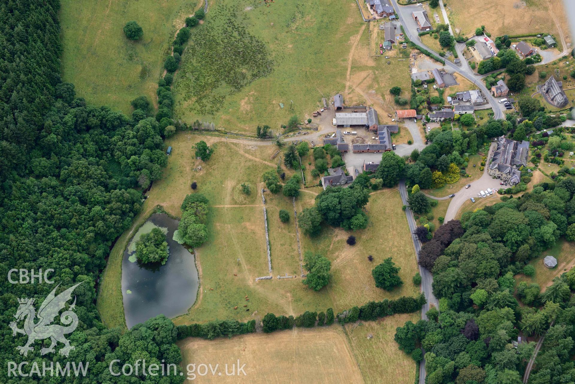 RCAHMW colour oblique aerial photograph of Abbey Cwmhir burial ground taken on 9 July 2018 by Toby Driver