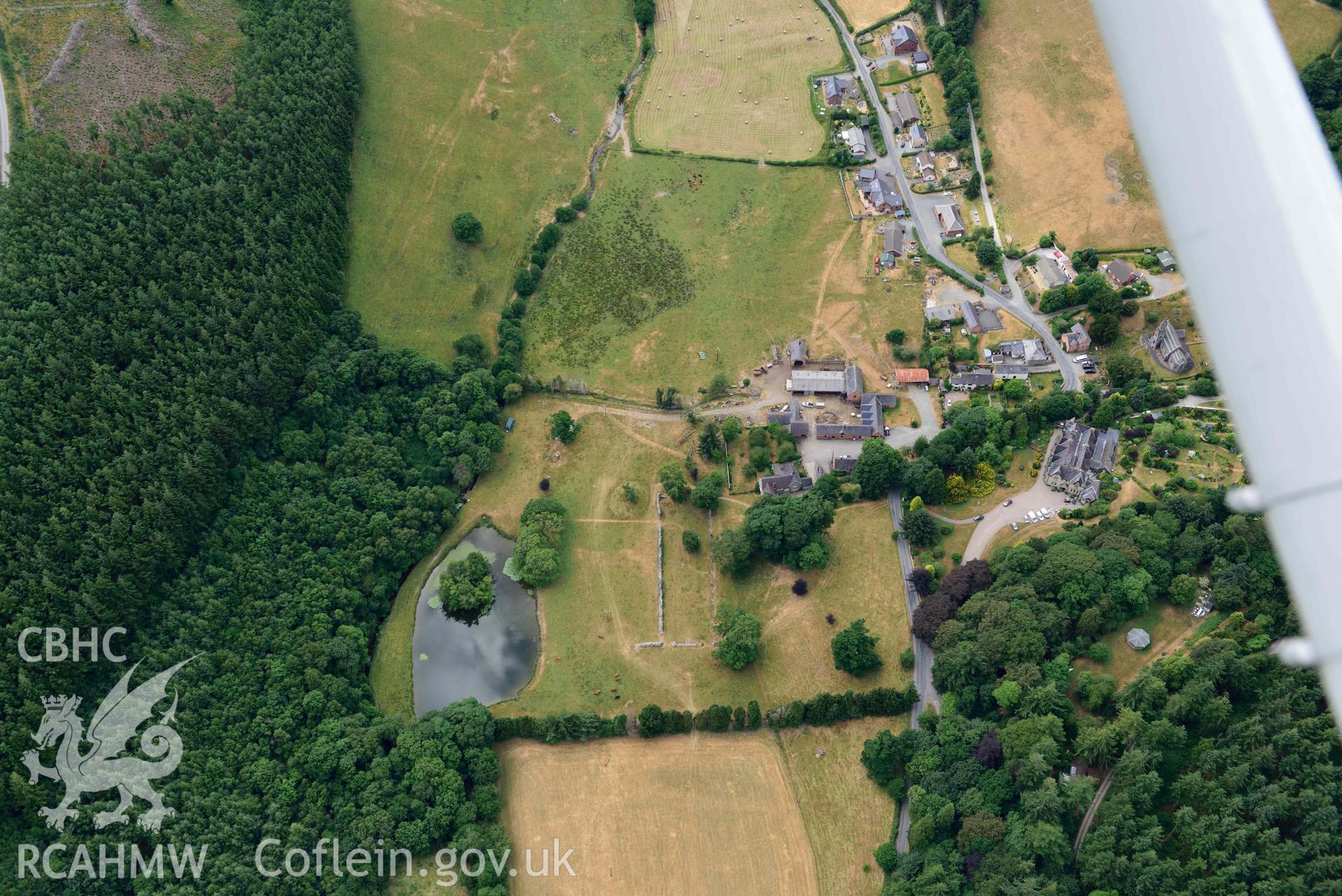 RCAHMW colour oblique aerial photograph of Abbey Cwmhir burial ground taken on 9 July 2018 by Toby Driver