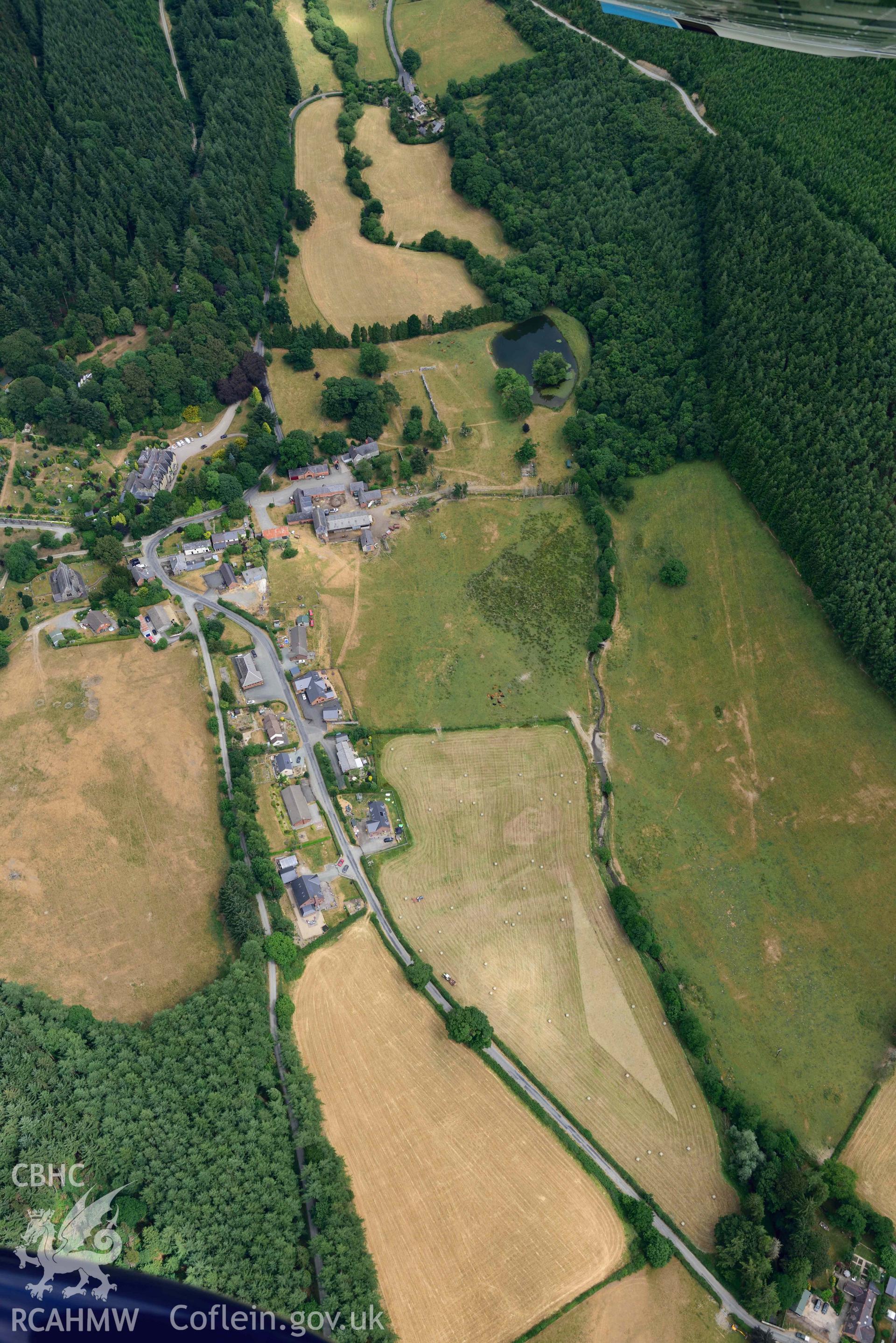 RCAHMW colour oblique aerial photograph of Abbey Cwmhir burial ground taken on 9 July 2018 by Toby Driver