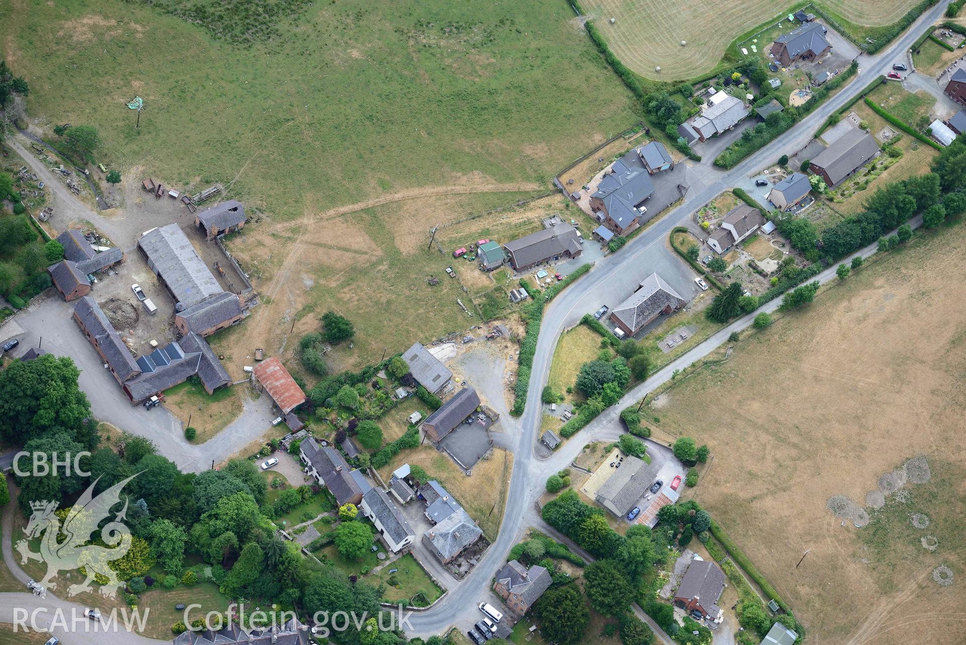 RCAHMW colour oblique aerial photograph of Abbey Cwmhir burial ground taken on 9 July 2018 by Toby Driver