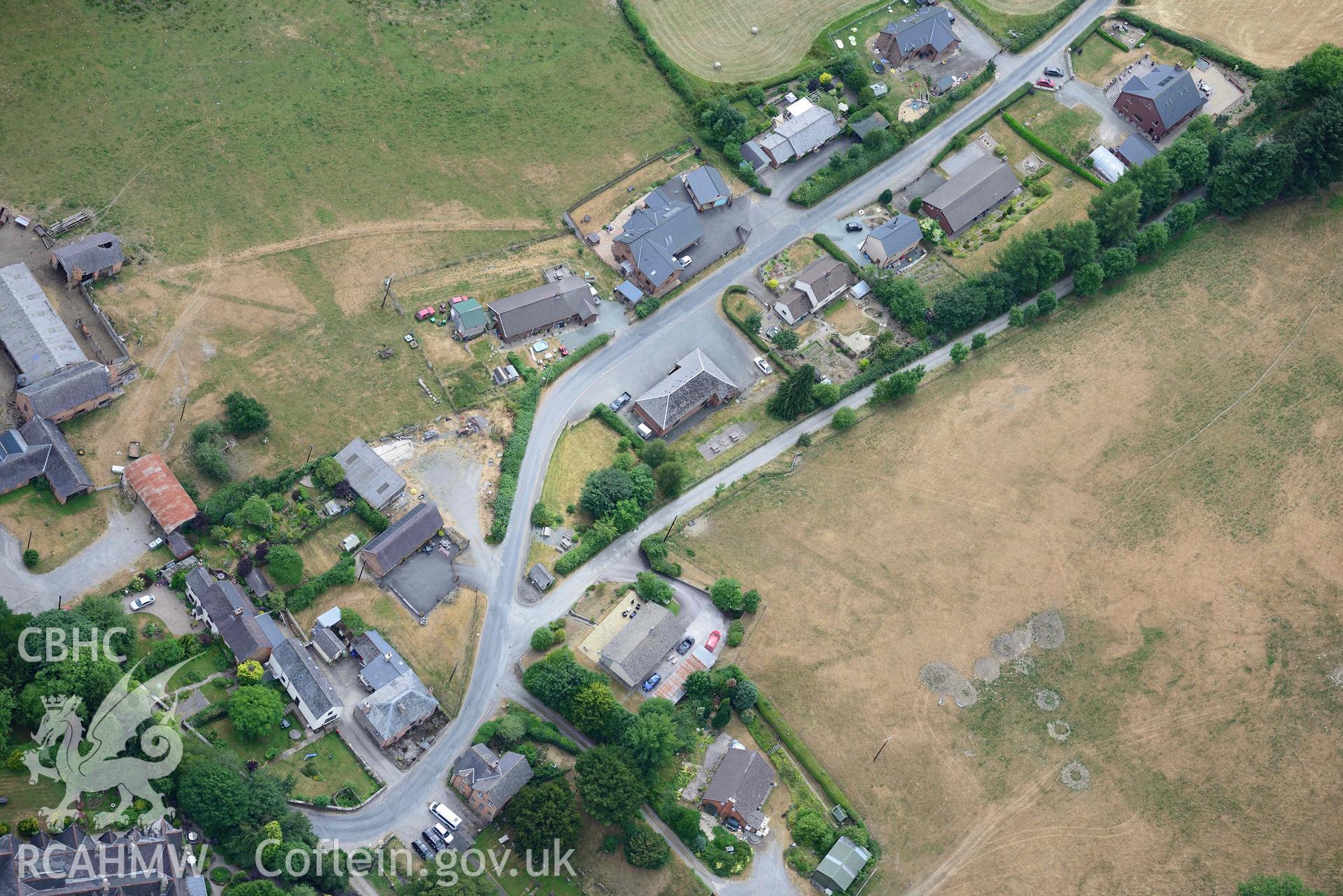 RCAHMW colour oblique aerial photograph of Abbey Cwmhir burial ground taken on 9 July 2018 by Toby Driver