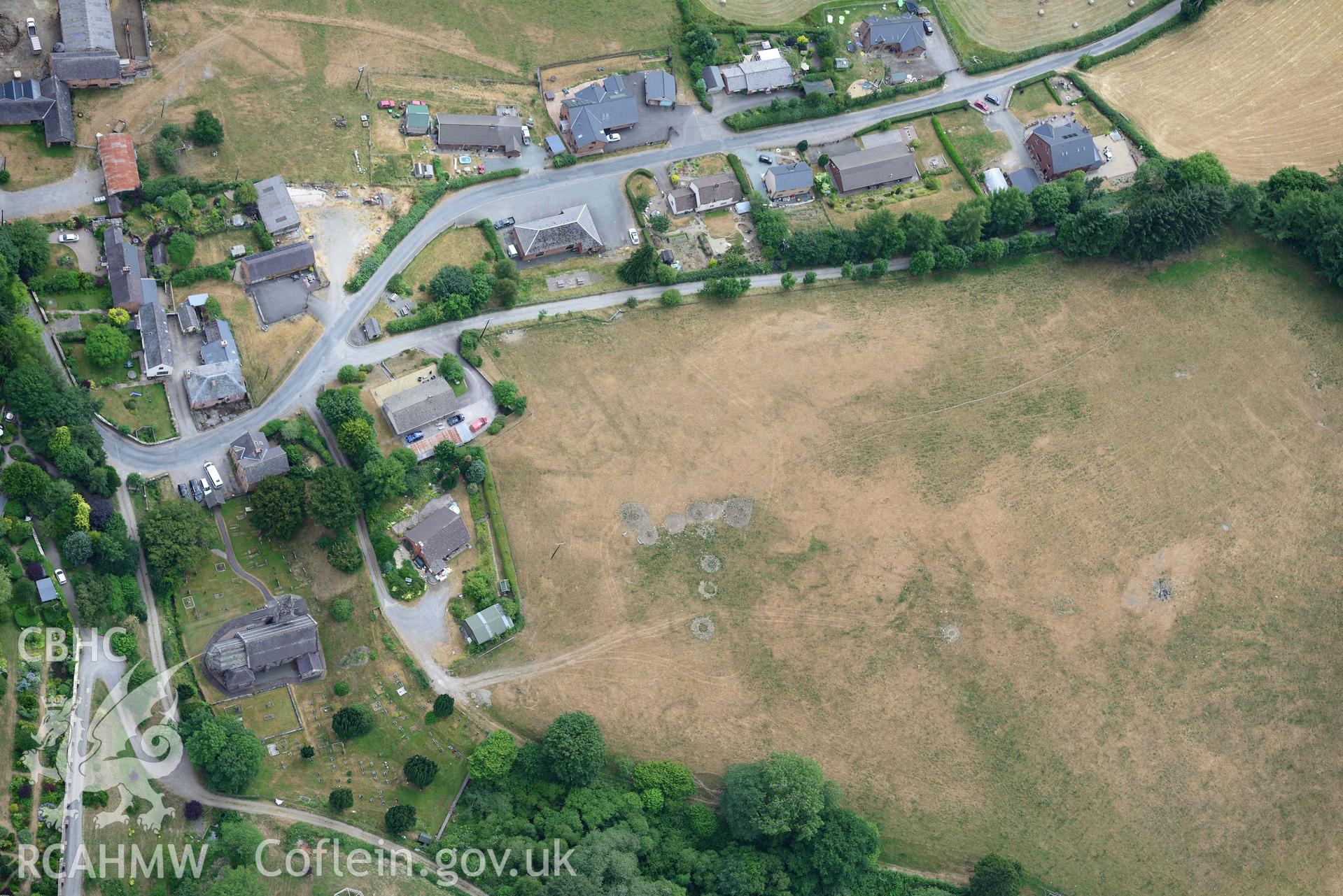 RCAHMW colour oblique aerial photograph of Abbey Cwmhir burial ground taken on 9 July 2018 by Toby Driver