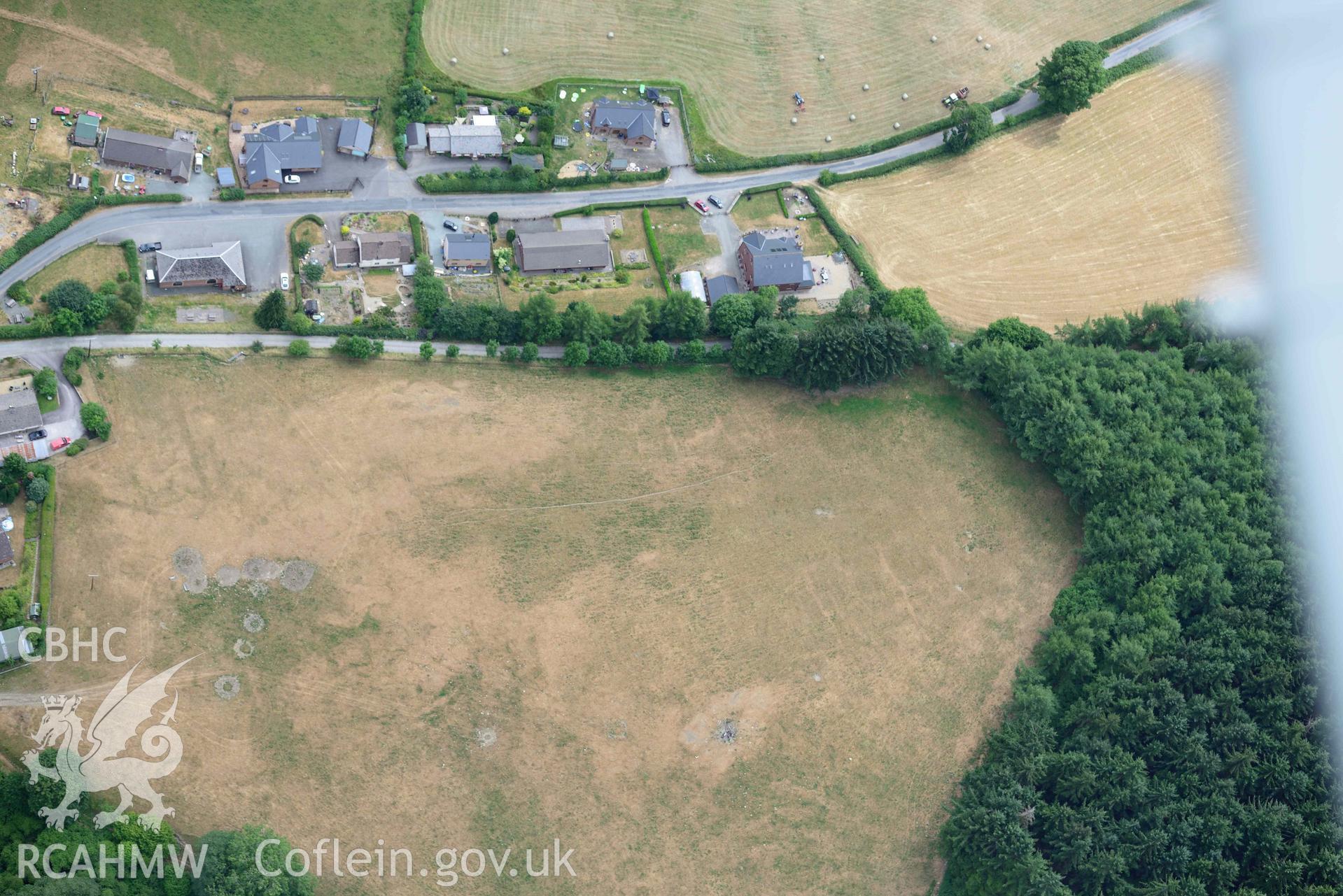 RCAHMW colour oblique aerial photograph of Abbey Cwmhir burial ground taken on 9 July 2018 by Toby Driver