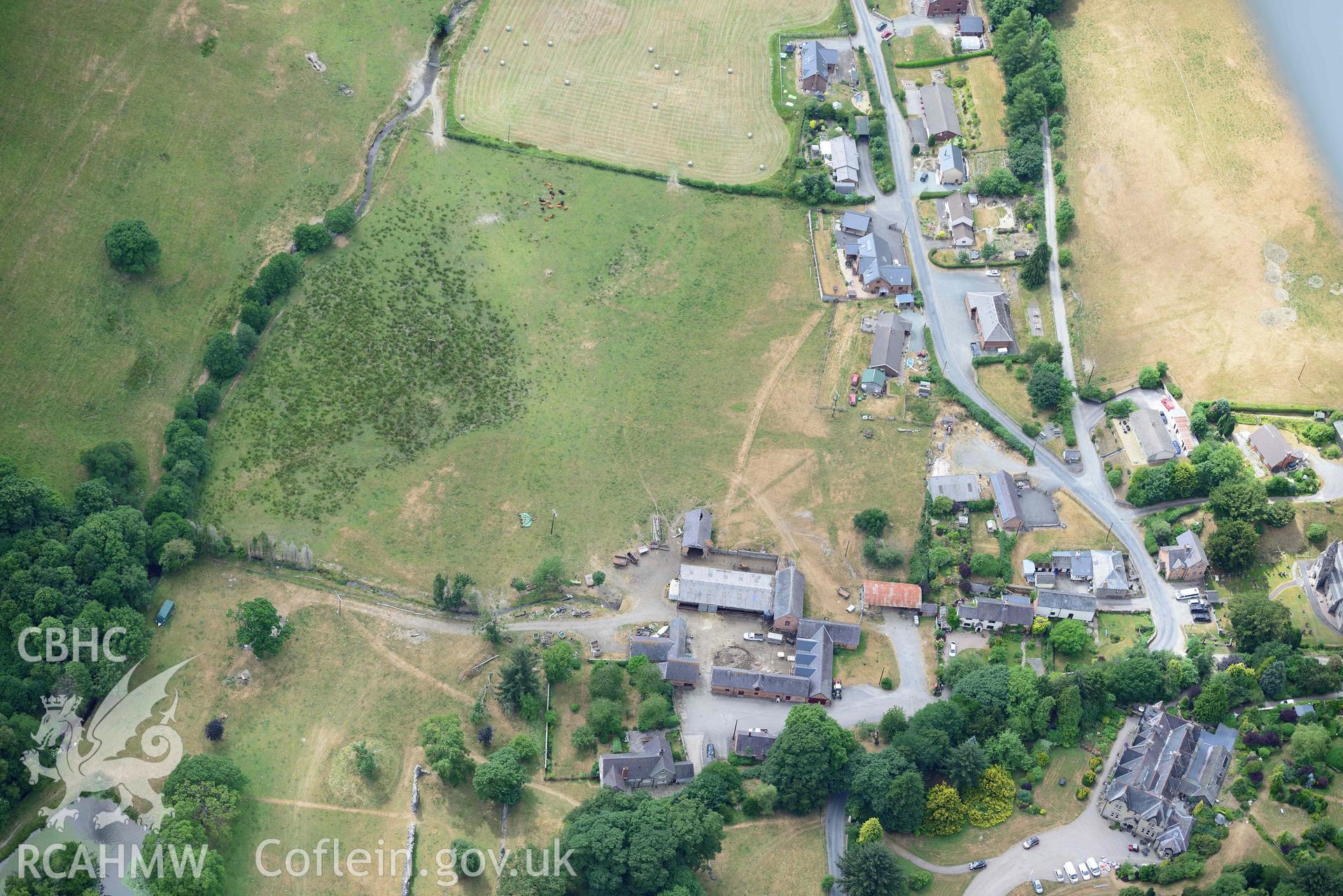 RCAHMW colour oblique aerial photograph of Abbey Cwmhir burial ground taken on 9 July 2018 by Toby Driver