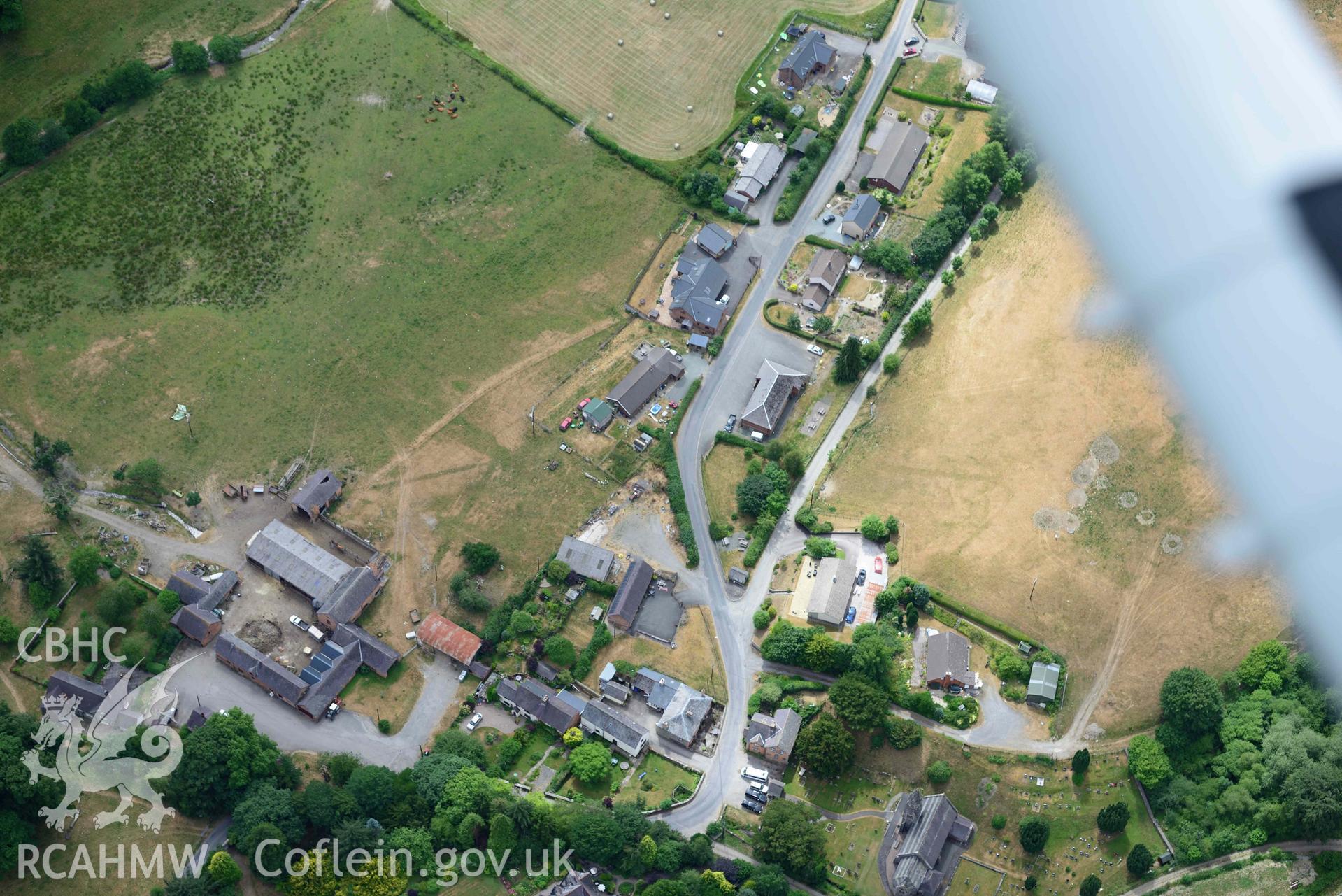 RCAHMW colour oblique aerial photograph of Abbey Cwmhir burial ground taken on 9 July 2018 by Toby Driver