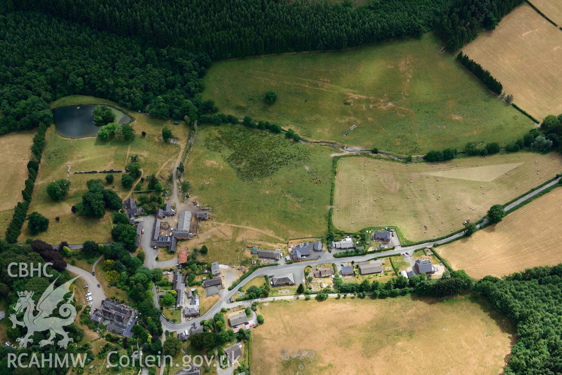 RCAHMW colour oblique aerial photograph of Abbey Cwmhir burial ground taken on 9 July 2018 by Toby Driver