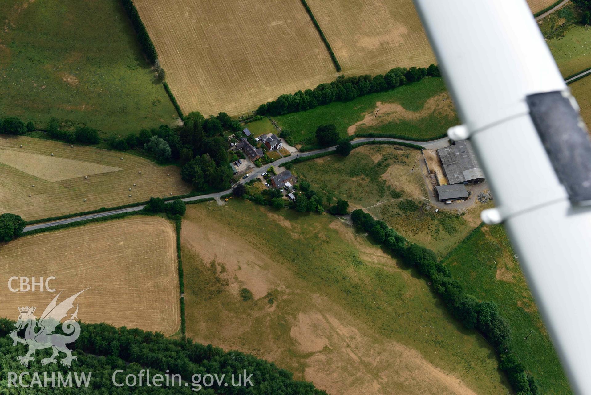 RCAHMW colour oblique aerial photograph of Wenallt Barn enclosures taken on 9 July 2018 by Toby Driver