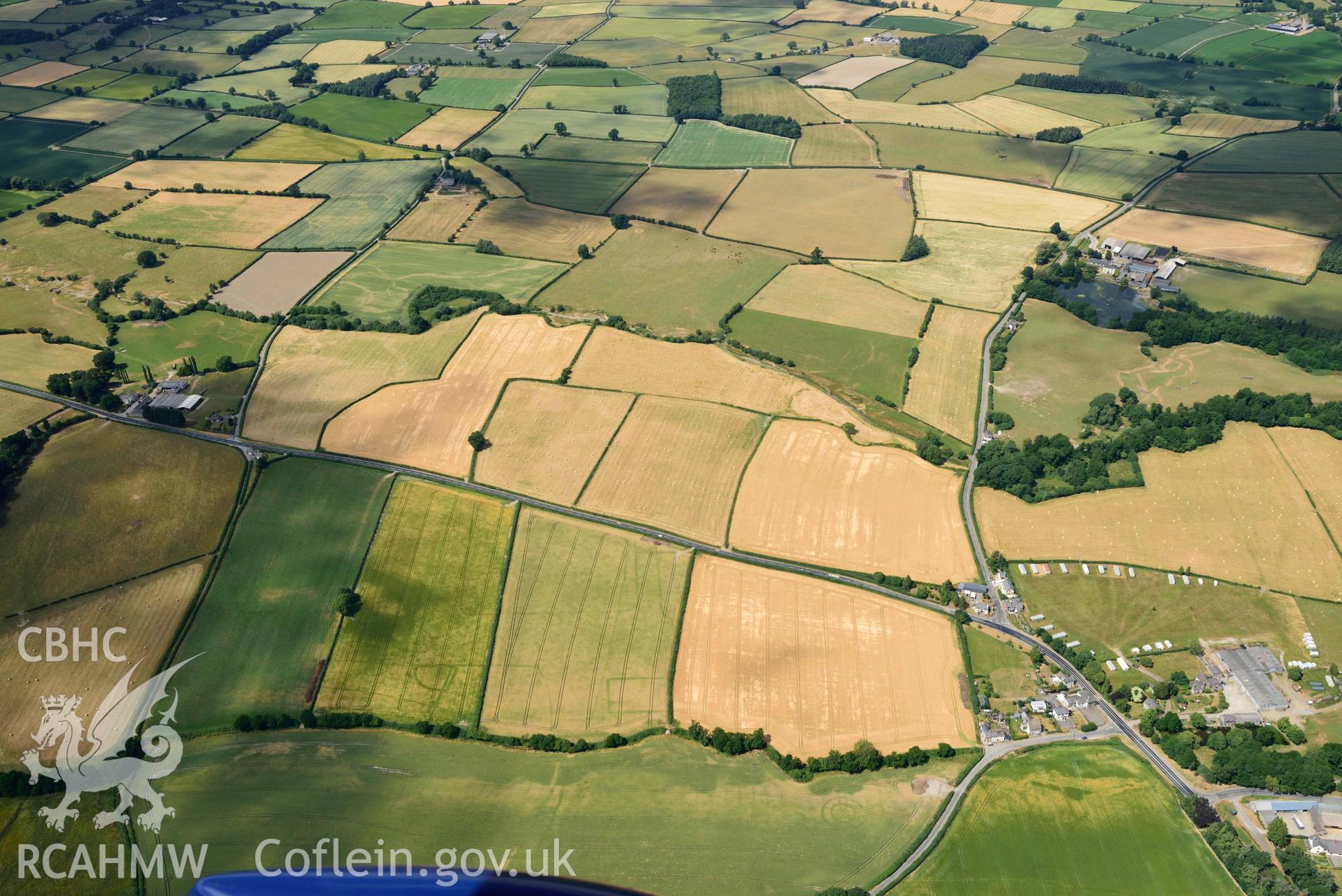 RCAHMW colour oblique aerial photograph of Walton Roman Camp III taken on 9 July 2018 by Toby Driver