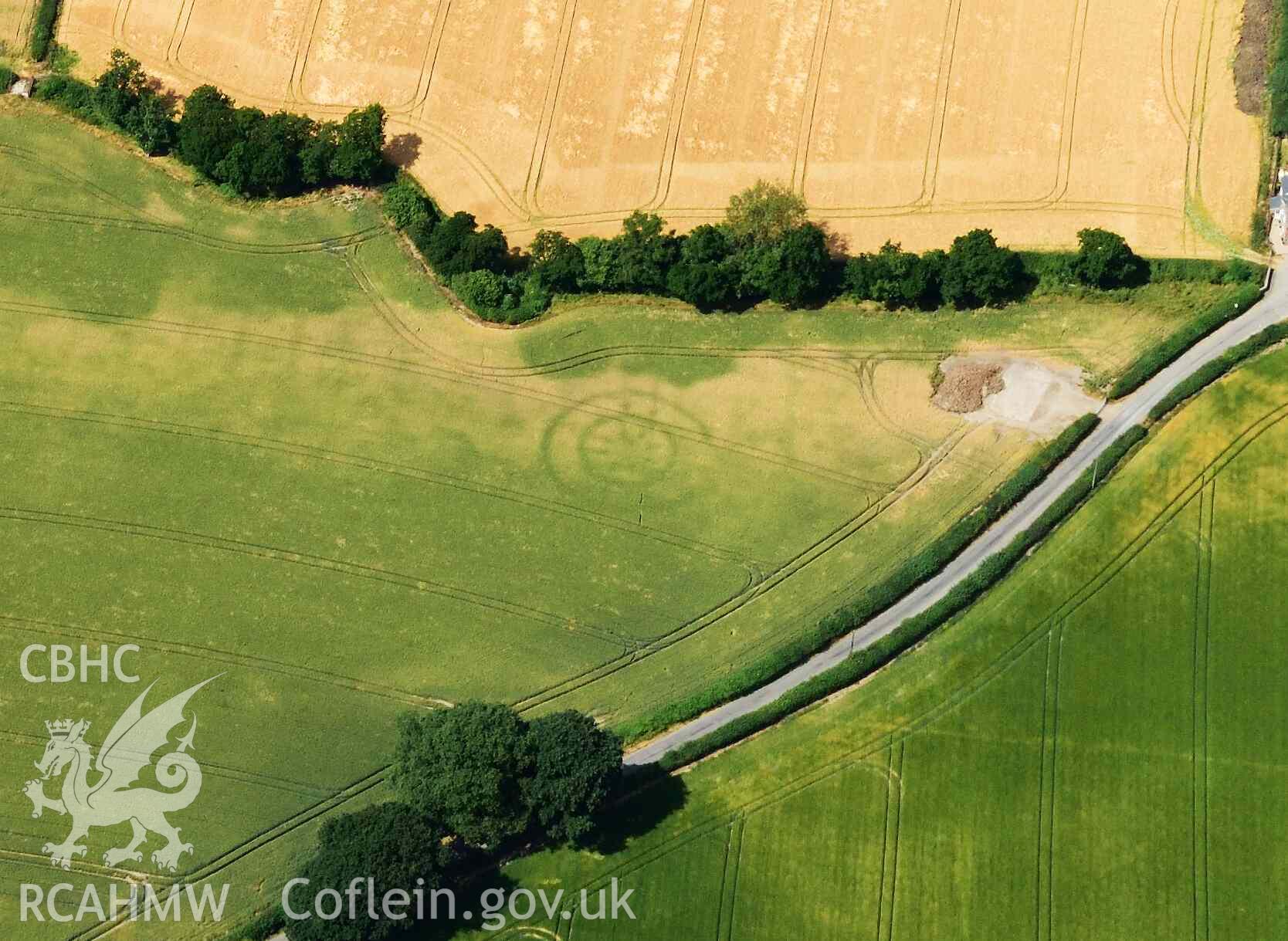 RCAHMW colour oblique aerial photograph of Walton Roman Camp III and Walton ring ditch or timber circle taken on 9 July 2018 by Toby Driver