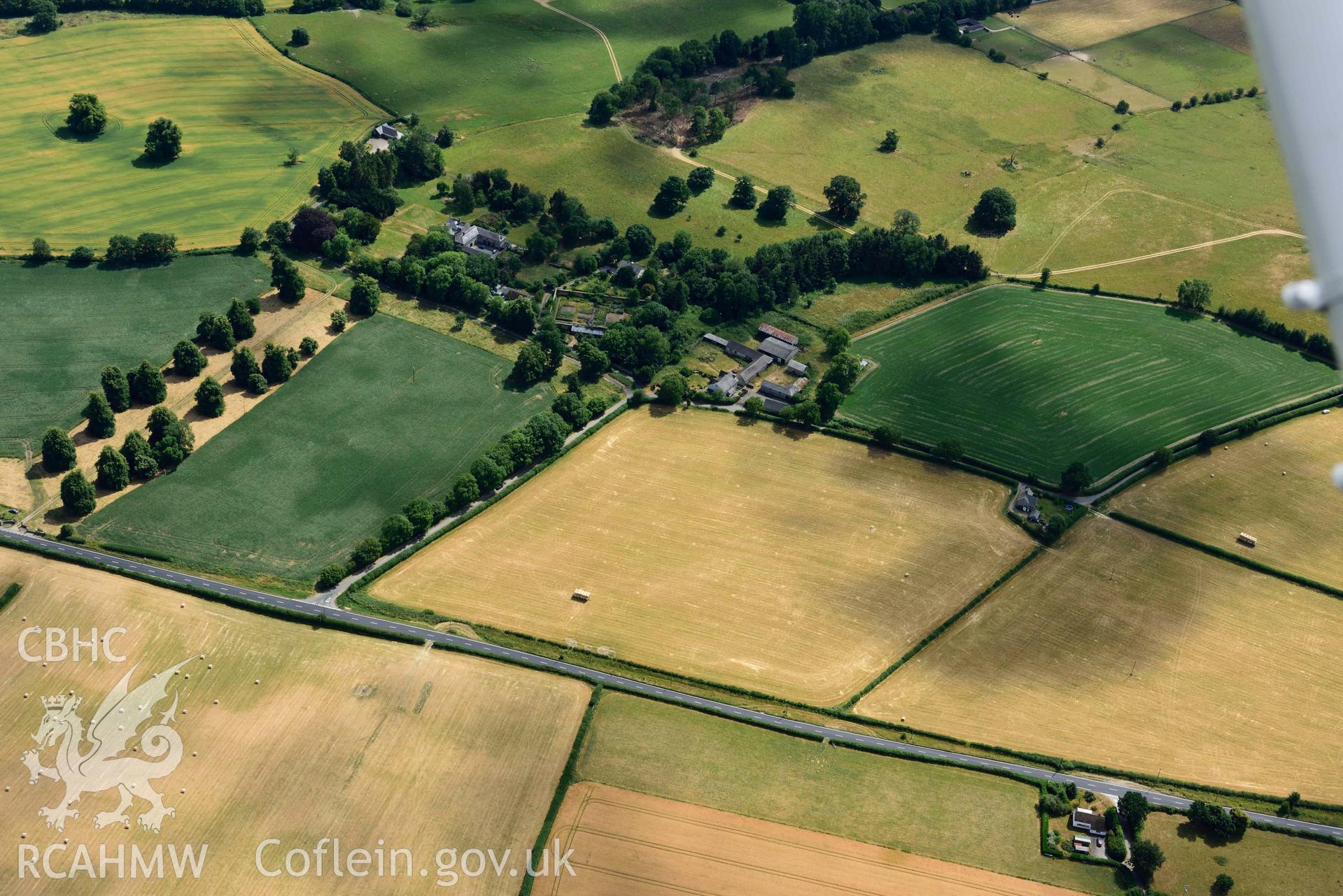 RCAHMW colour oblique aerial photograph of Harpton Fortlet taken on 9 July 2018 by Toby Driver