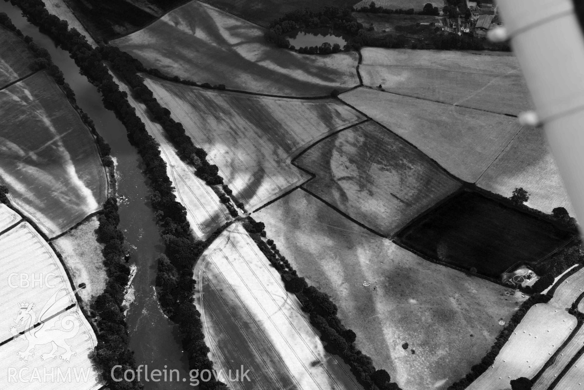 RCAHMW black and white oblique aerial photograph of Early fields at Llyswen taken on 9 July 2018 by Toby Driver