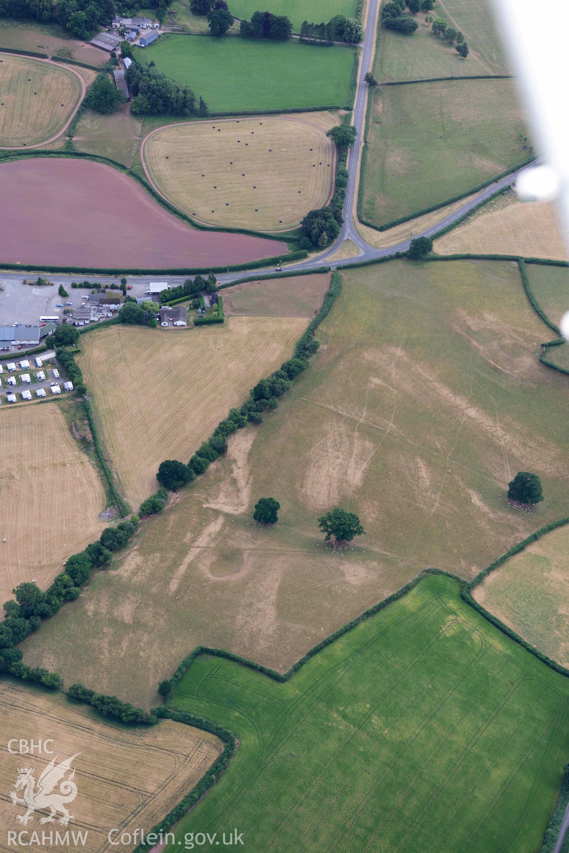 RCAHMW colour oblique aerial photograph of Bishops Meadow cropmarks taken on 9 July 2018 by Toby Driver