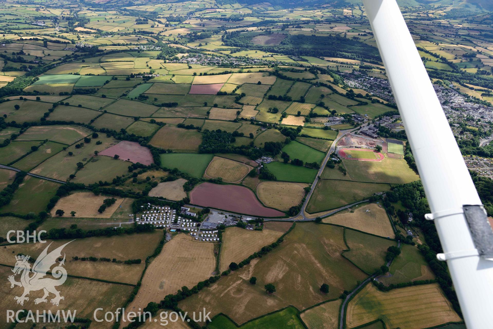 RCAHMW colour oblique aerial photograph of Bishops Meadow cropmarks taken on 9 July 2018 by Toby Driver