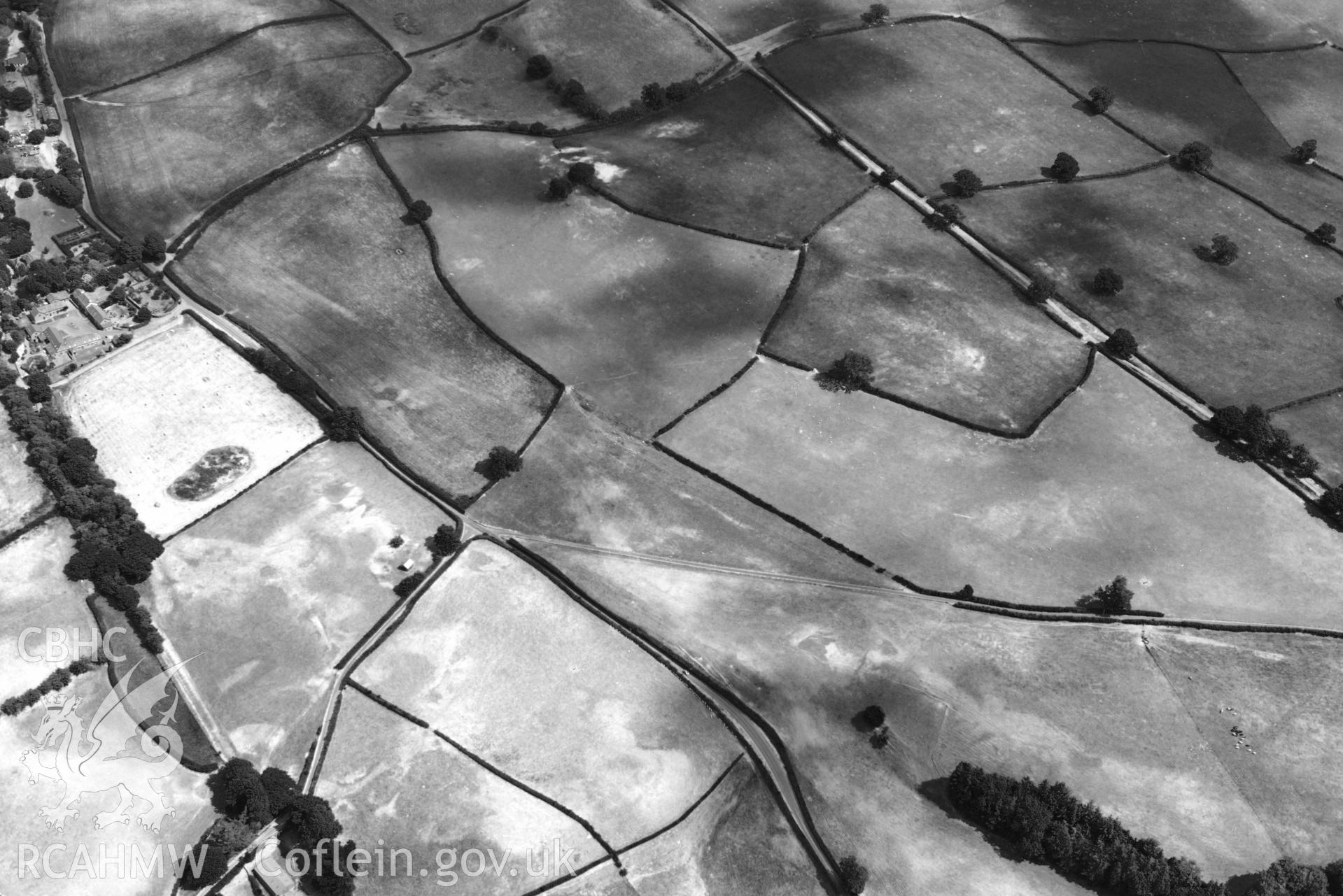 RCAHMW colour oblique aerial photograph of Pool Farm roman road west of Pool Farm taken on 9 July 2018 by Toby Driver