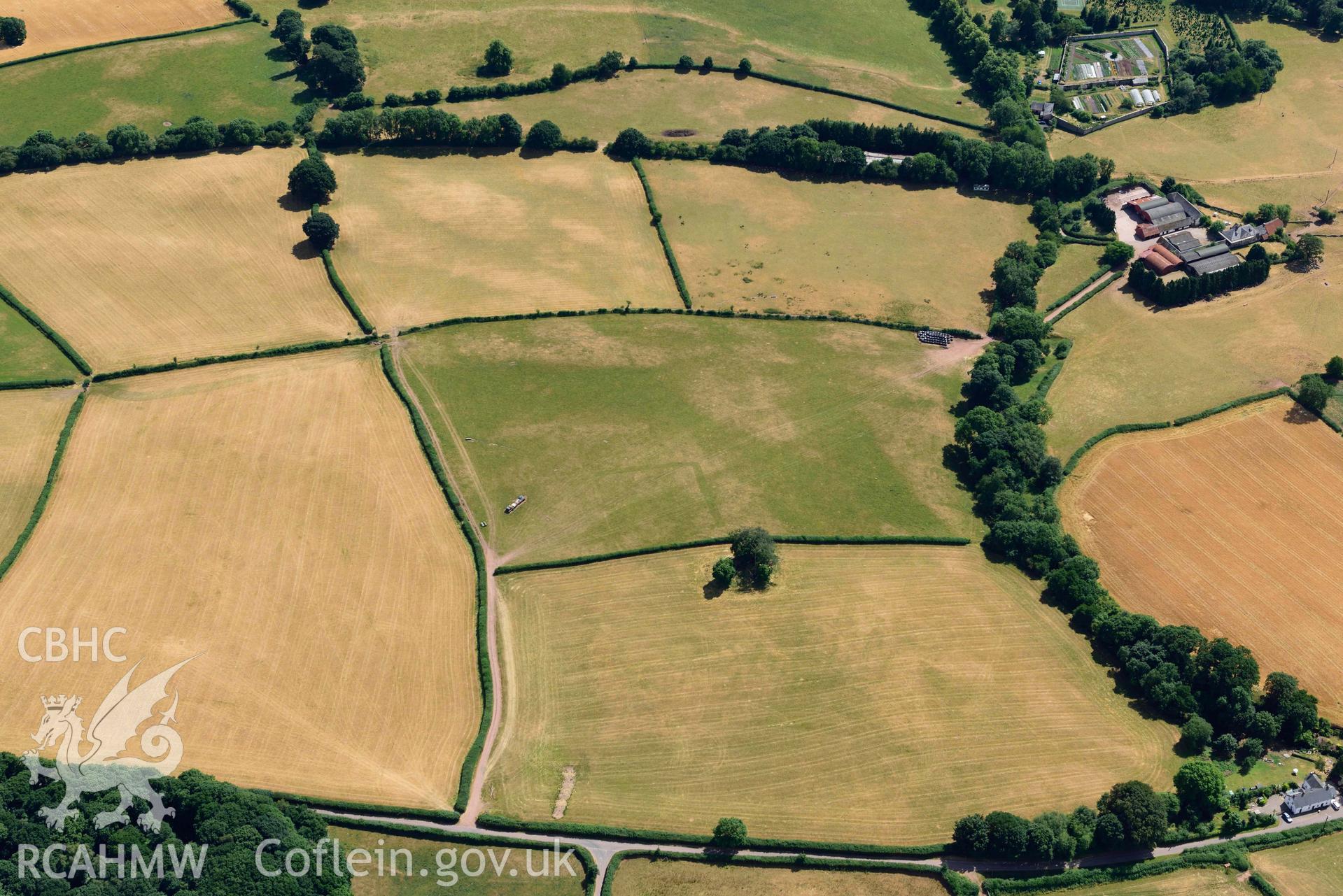 RCAHMW colour oblique aerial photograph of Abersefin cropmark enclosure taken on 9 July 2018 by Toby Driver