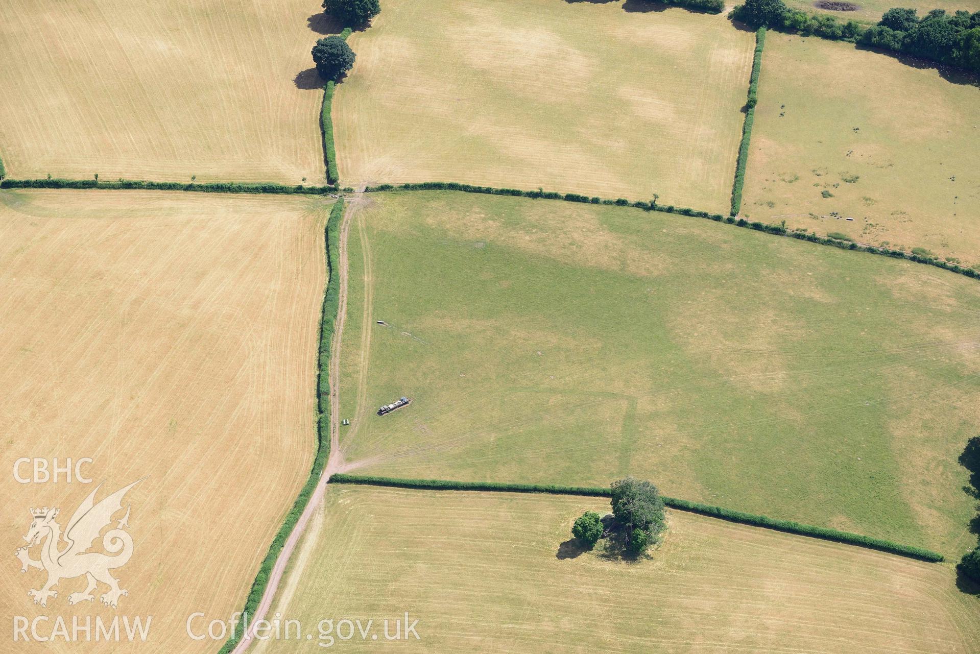 RCAHMW colour oblique aerial photograph of Abersefin cropmark enclosure taken on 9 July 2018 by Toby Driver