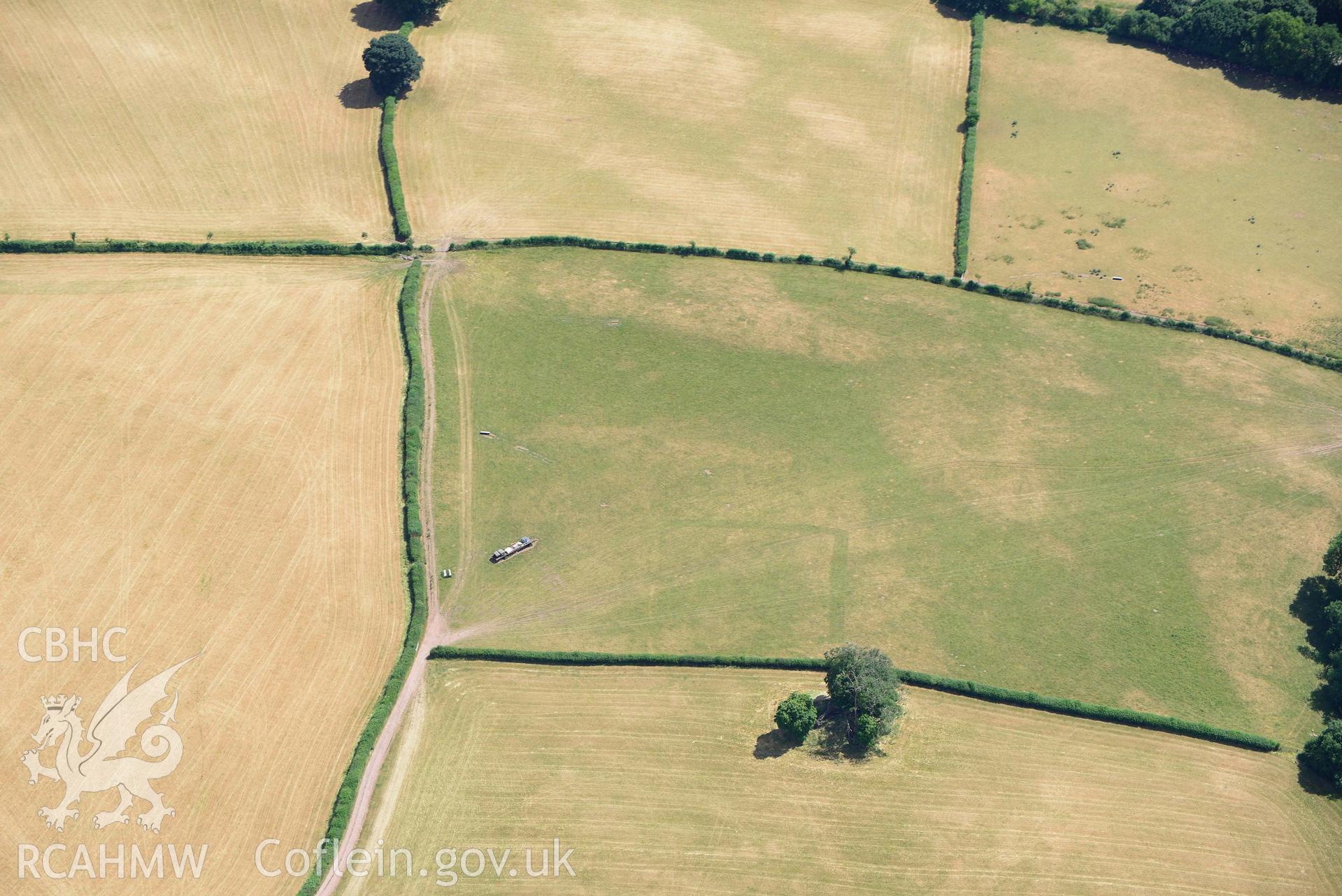 RCAHMW black and white oblique aerial photograph of Abersefin cropmark enclosure taken on 9 July 2018 by Toby Driver