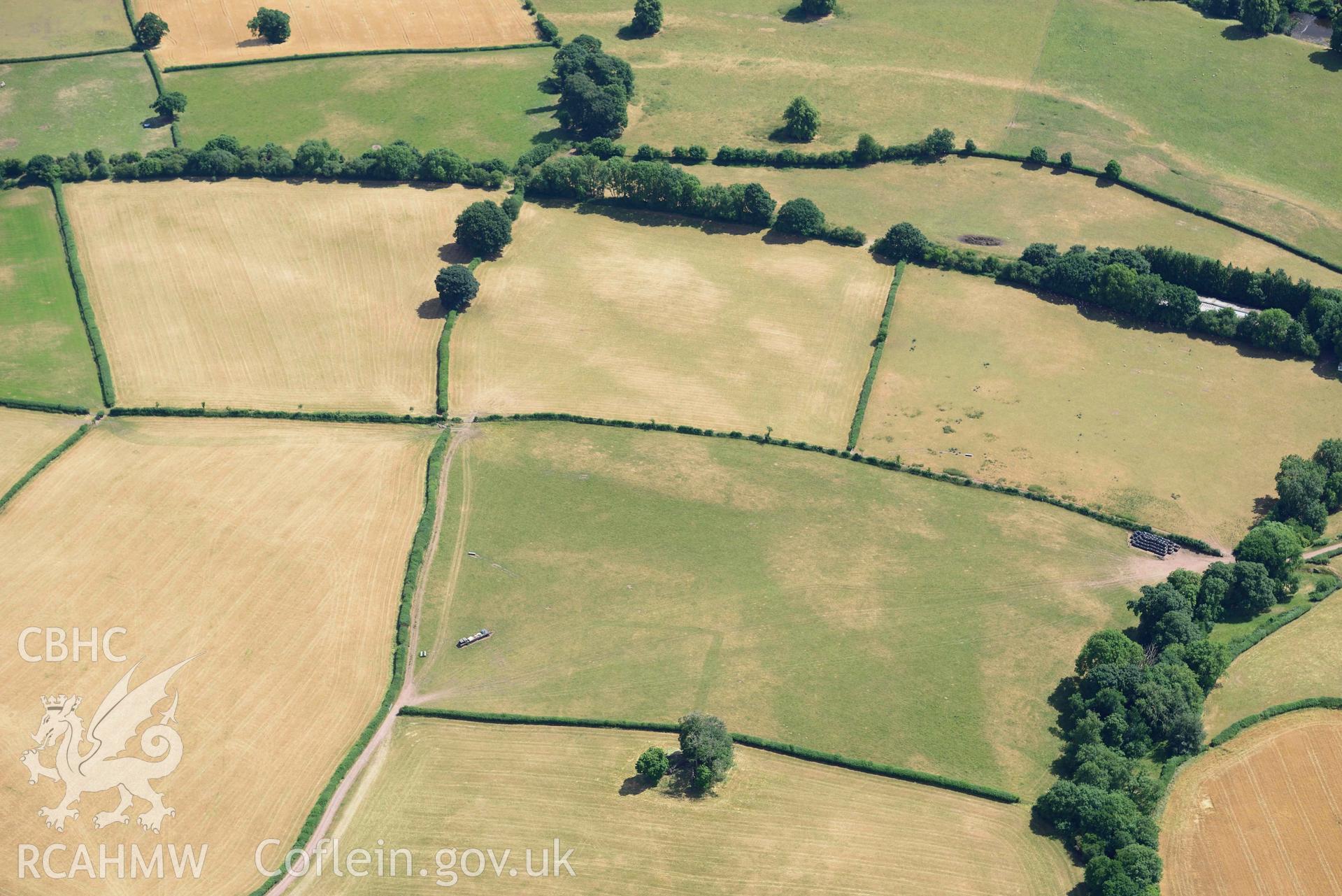 RCAHMW colour oblique aerial photograph of Abersefin cropmark enclosure taken on 9 July 2018 by Toby Driver