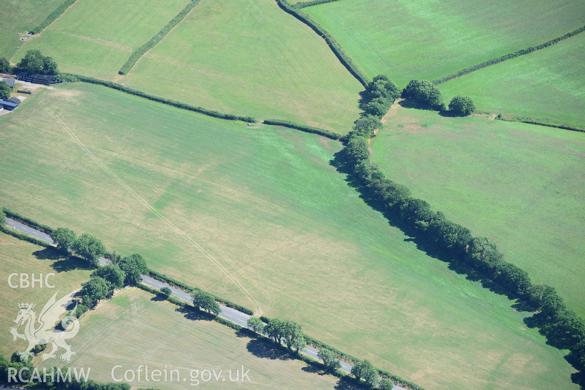 RCAHMW colour oblique aerial photograph of Moor round barrow taken on 9 July 2018 by Toby Driver