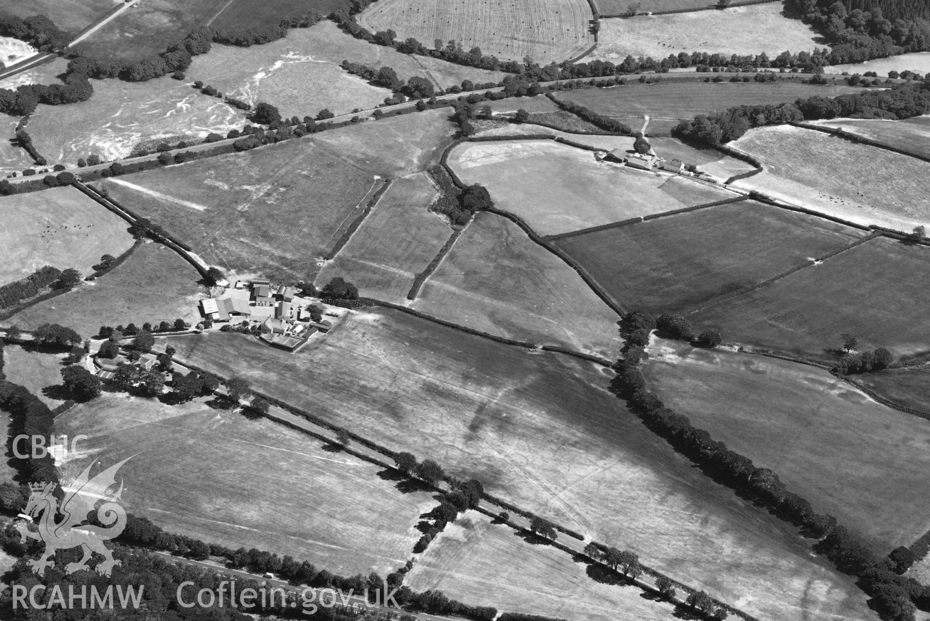 RCAHMW colour oblique aerial photograph of Moor round barrow taken on 9 July 2018 by Toby Driver