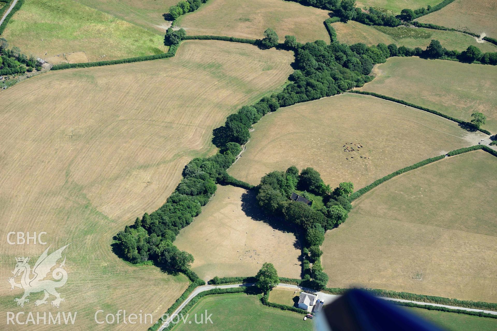 RCAHMW colour oblique aerial photograph of  St Cannas enclosure complex taken on 9 July 2018 by Toby Driver