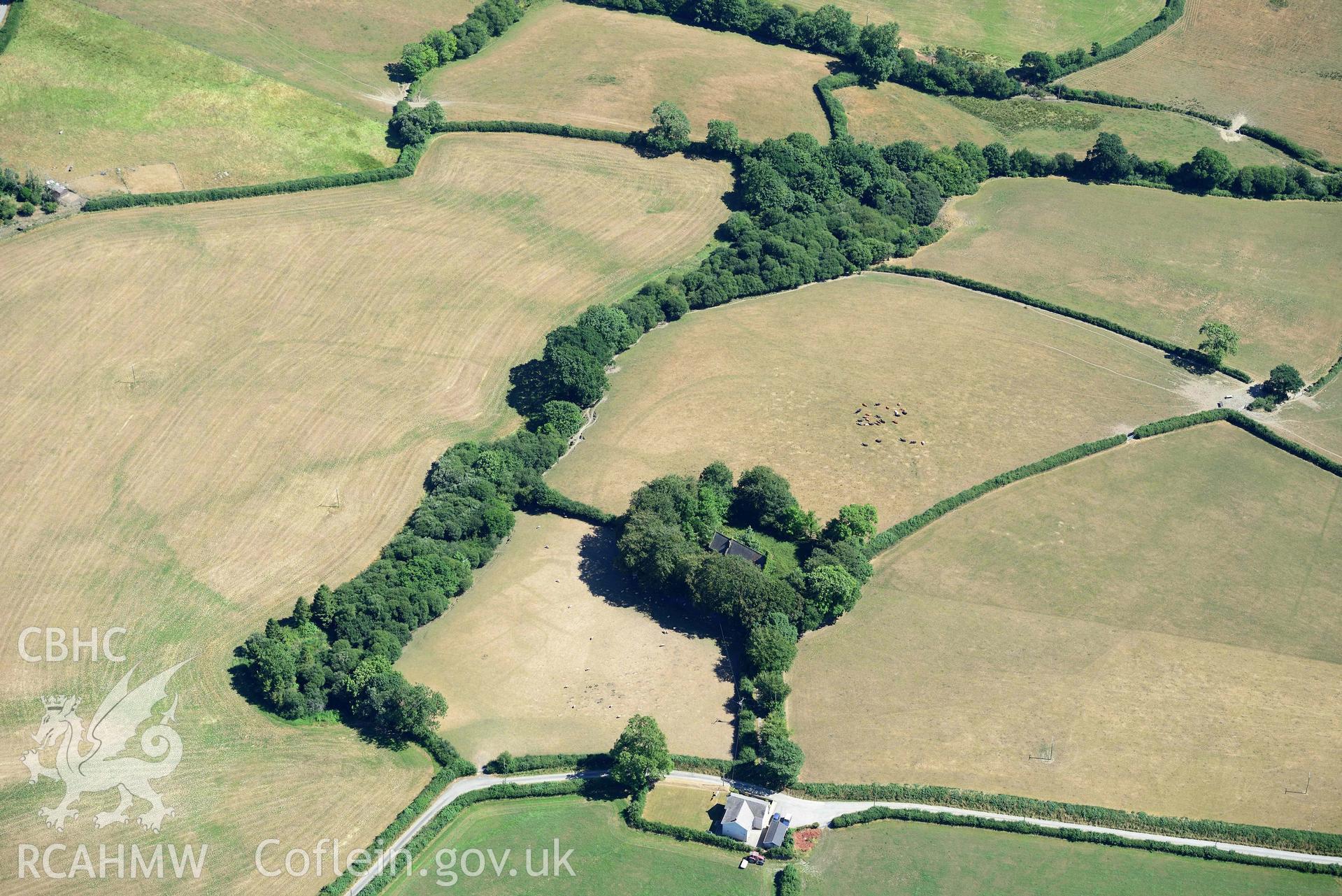 RCAHMW colour oblique aerial photograph of  St Cannas enclosure complex taken on 9 July 2018 by Toby Driver