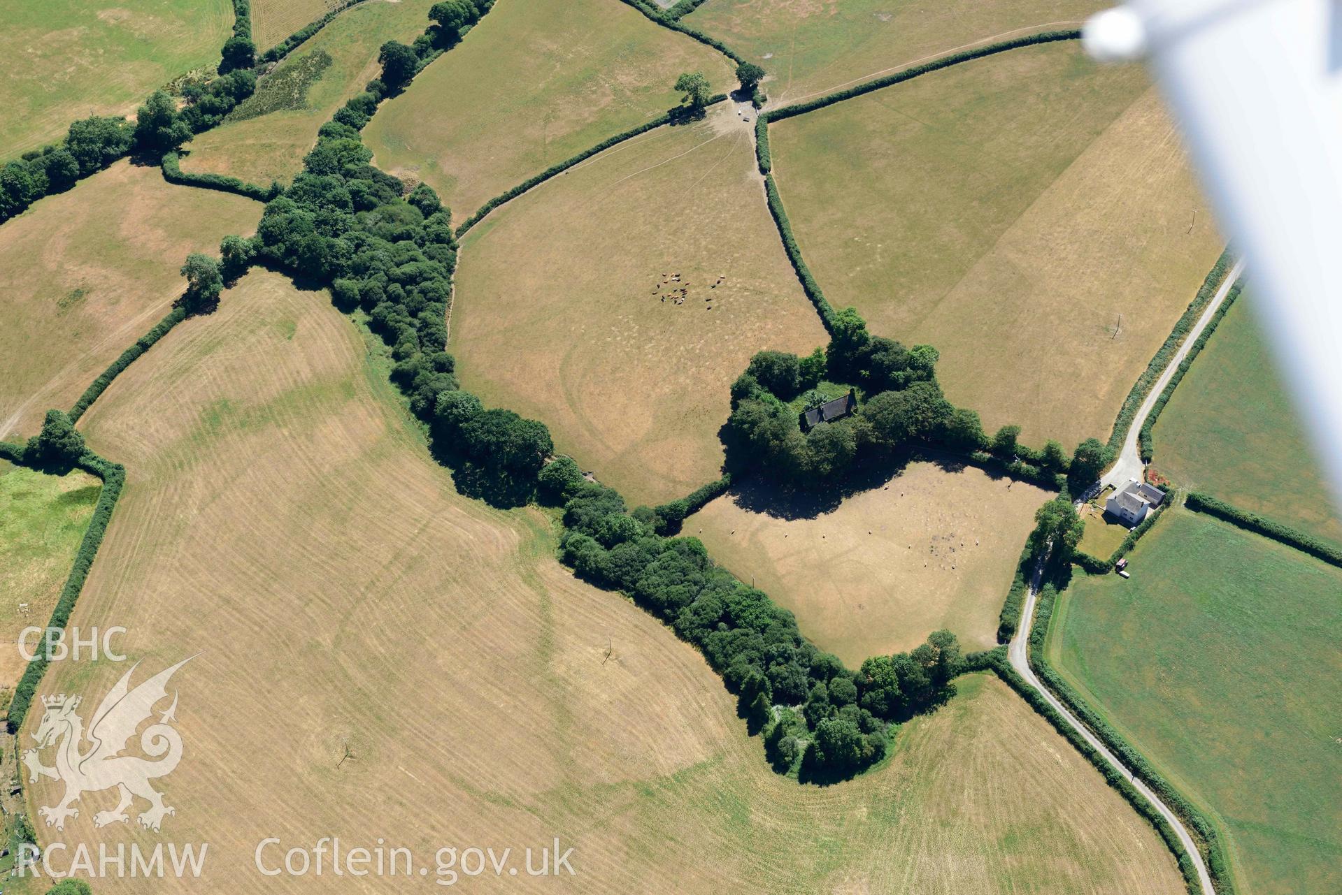 RCAHMW colour oblique aerial photograph of  St Cannas enclosure complex taken on 9 July 2018 by Toby Driver