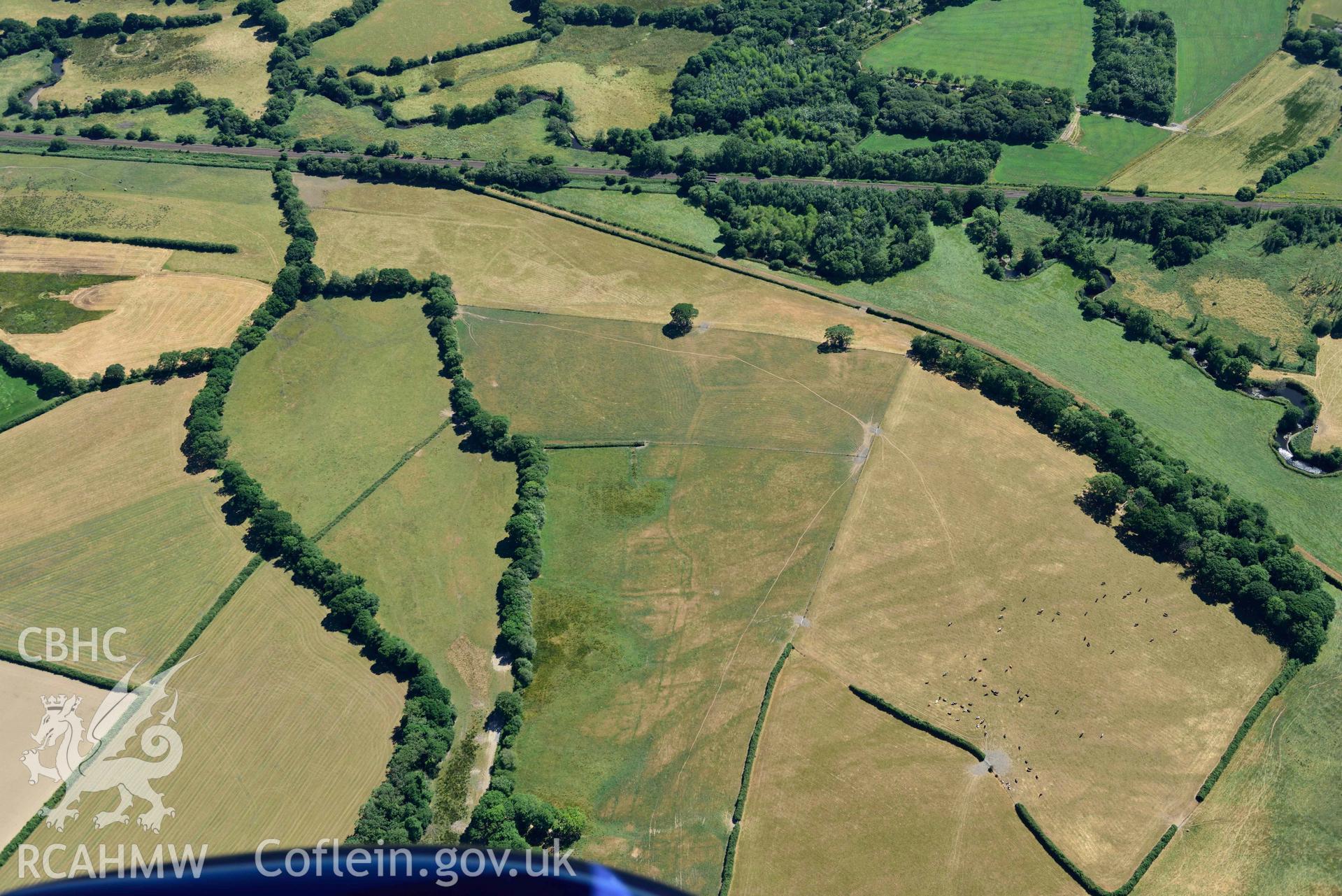 RCAHMW black and white oblique aerial photograph of Cefnfarchen deserted medieval settlement taken on 9 July 2018 by Toby Driver