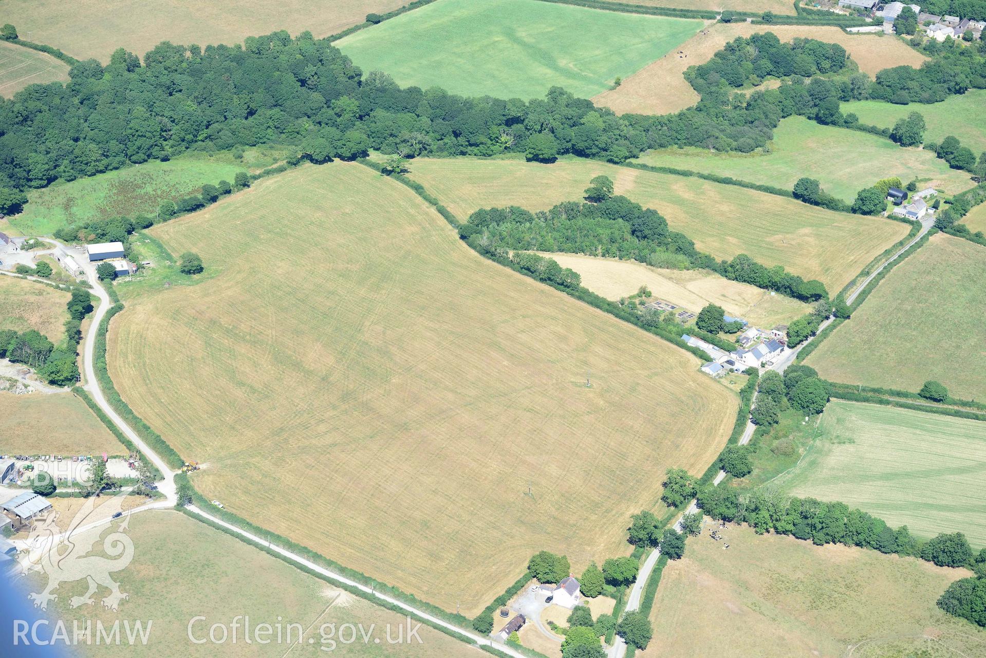 RCAHMW colour oblique aerial photograph of Plas y Parc cropmark enclosure taken on 9 July 2018 by Toby Driver