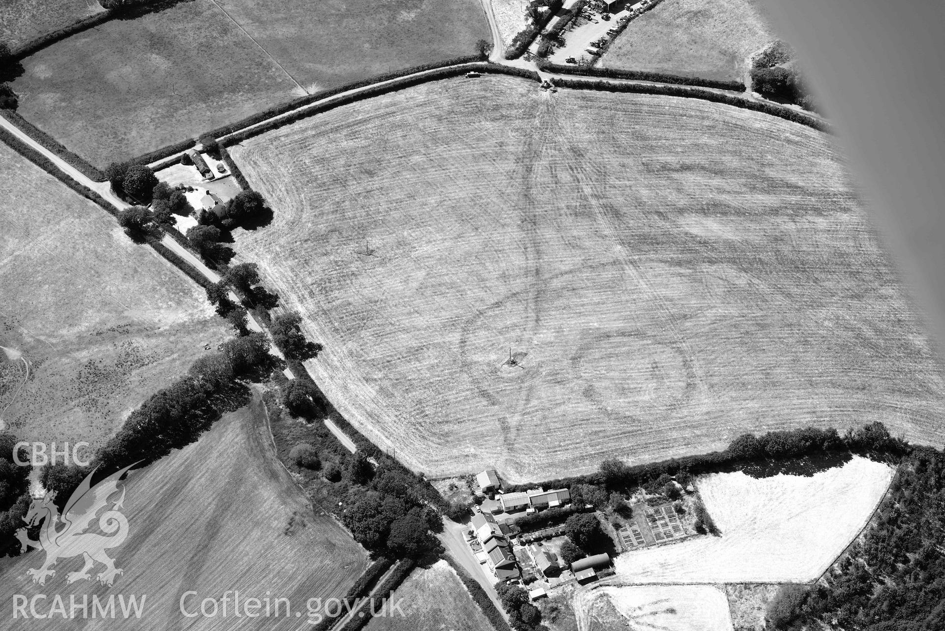 RCAHMW colour oblique aerial photograph of Plas y Parc cropmark enclosure taken on 9 July 2018 by Toby Driver