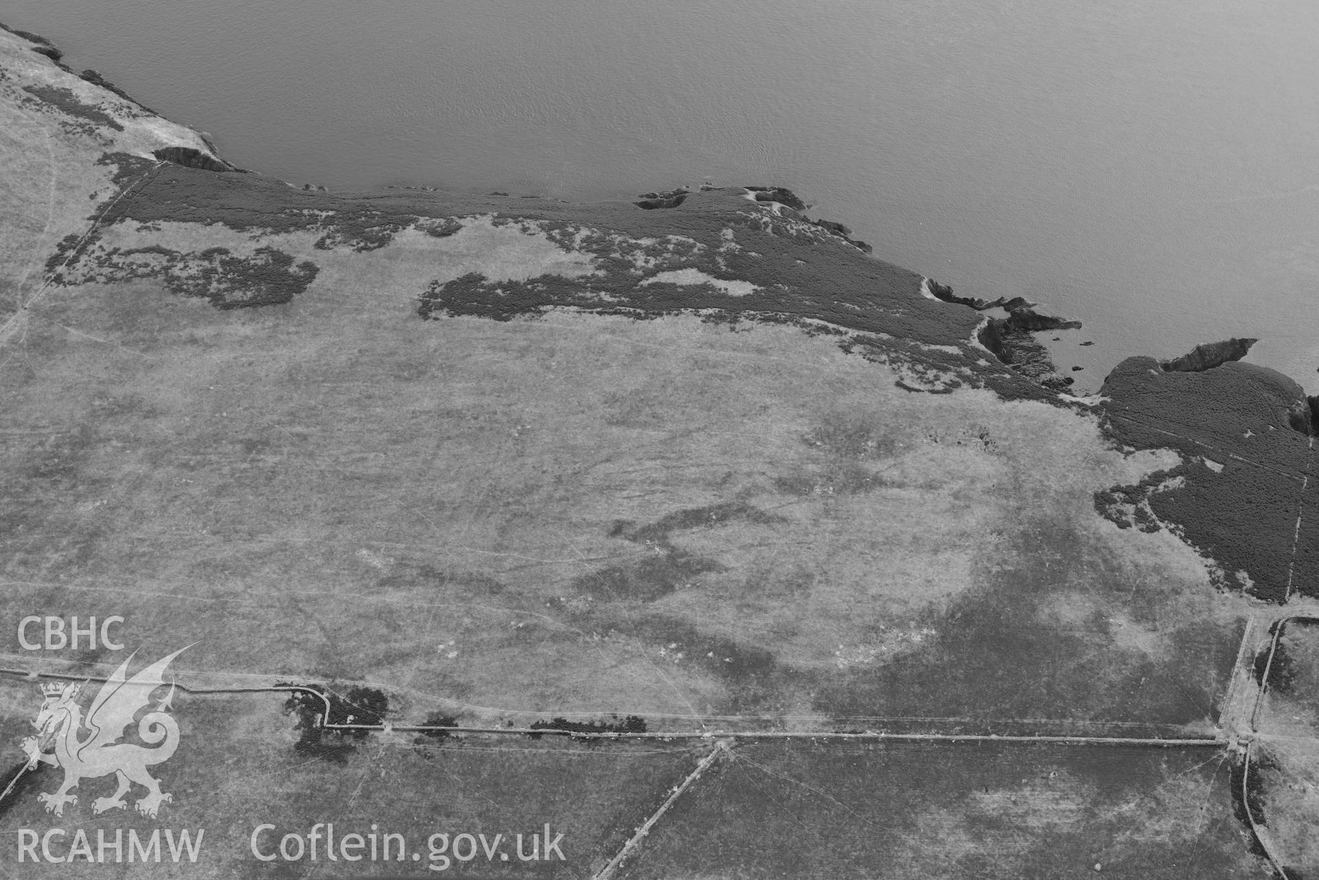 Ramsey Island, parchmarks at Parc y Capel - SM704244, with colour bands rebalanced to show cropmark archaeology. © Crown: CHERISH PROJECT 2017. Produced with EU funds through the Ireland Wales Co-operation Programme 2014-2023.